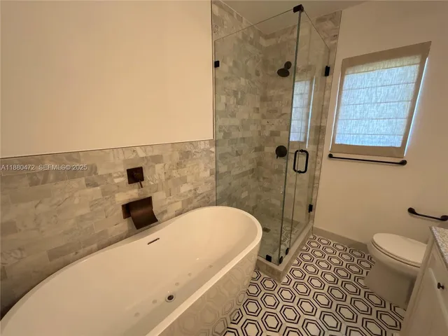 a bathroom with a sink and a shower