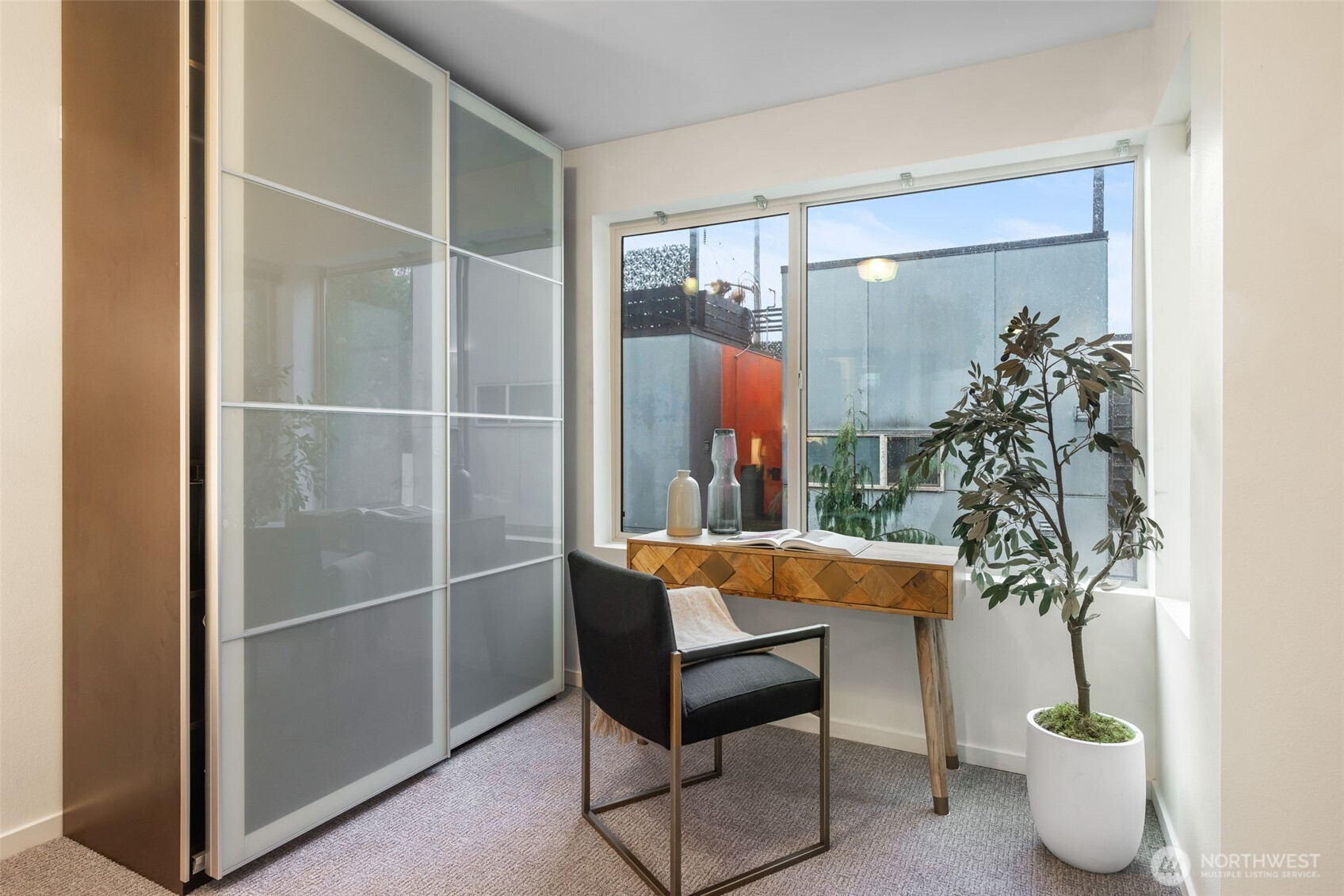 7758 Delridge Way Southwest Seattle, WA 98106 - Photo 12 of 22 a outdoor dining space with furniture and a potted plant