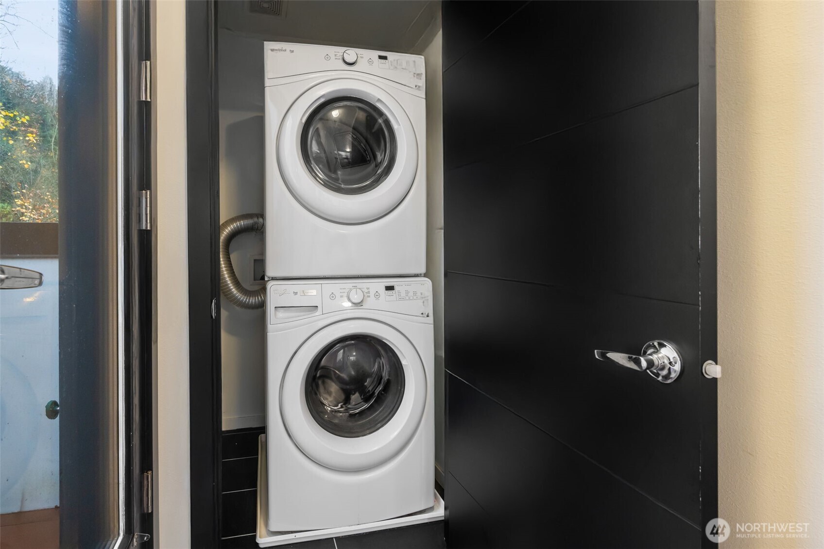 7758 Delridge Way Southwest Seattle, WA 98106 - Photo 14 of 22 a utility room with dryer and washer