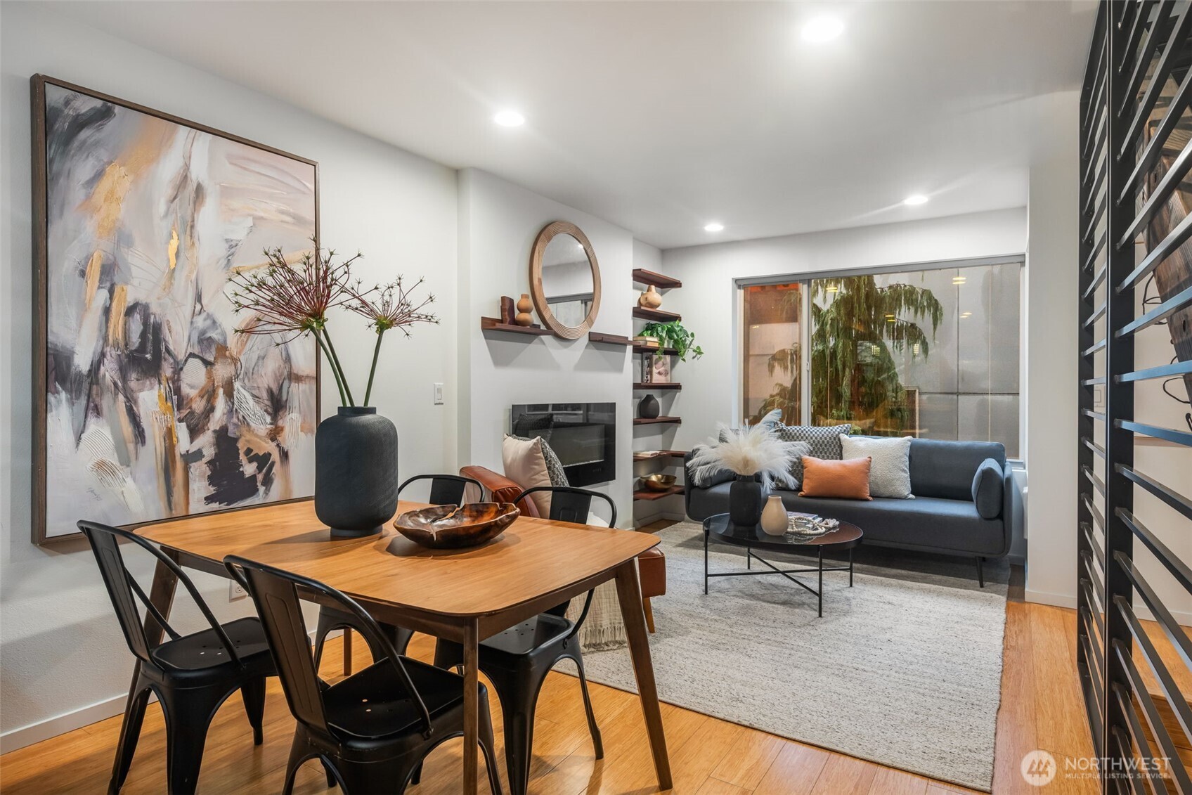 7758 Delridge Way Southwest Seattle, WA 98106 - Photo 4 of 22 a living room with furniture and a large window