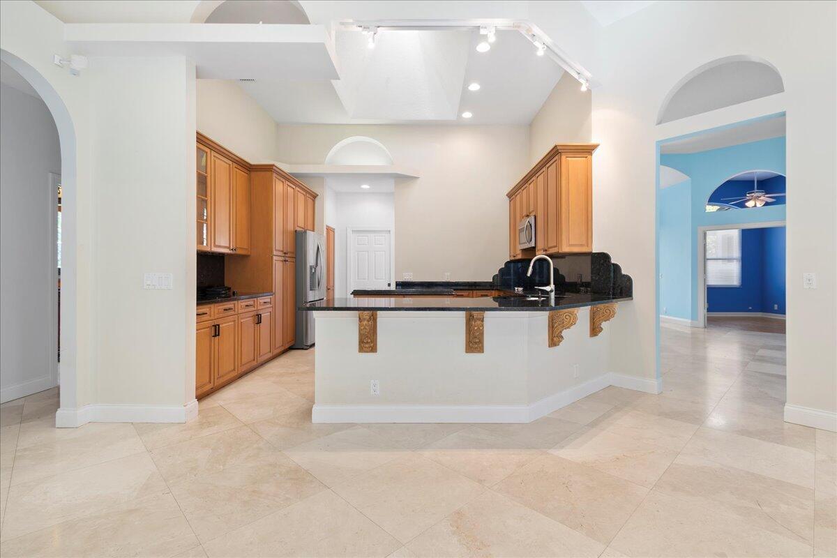 6989 Cypress Cove Circle Jupiter, FL 33458 - Photo 18 of 47 a view of living room with furniture and flat screen tv