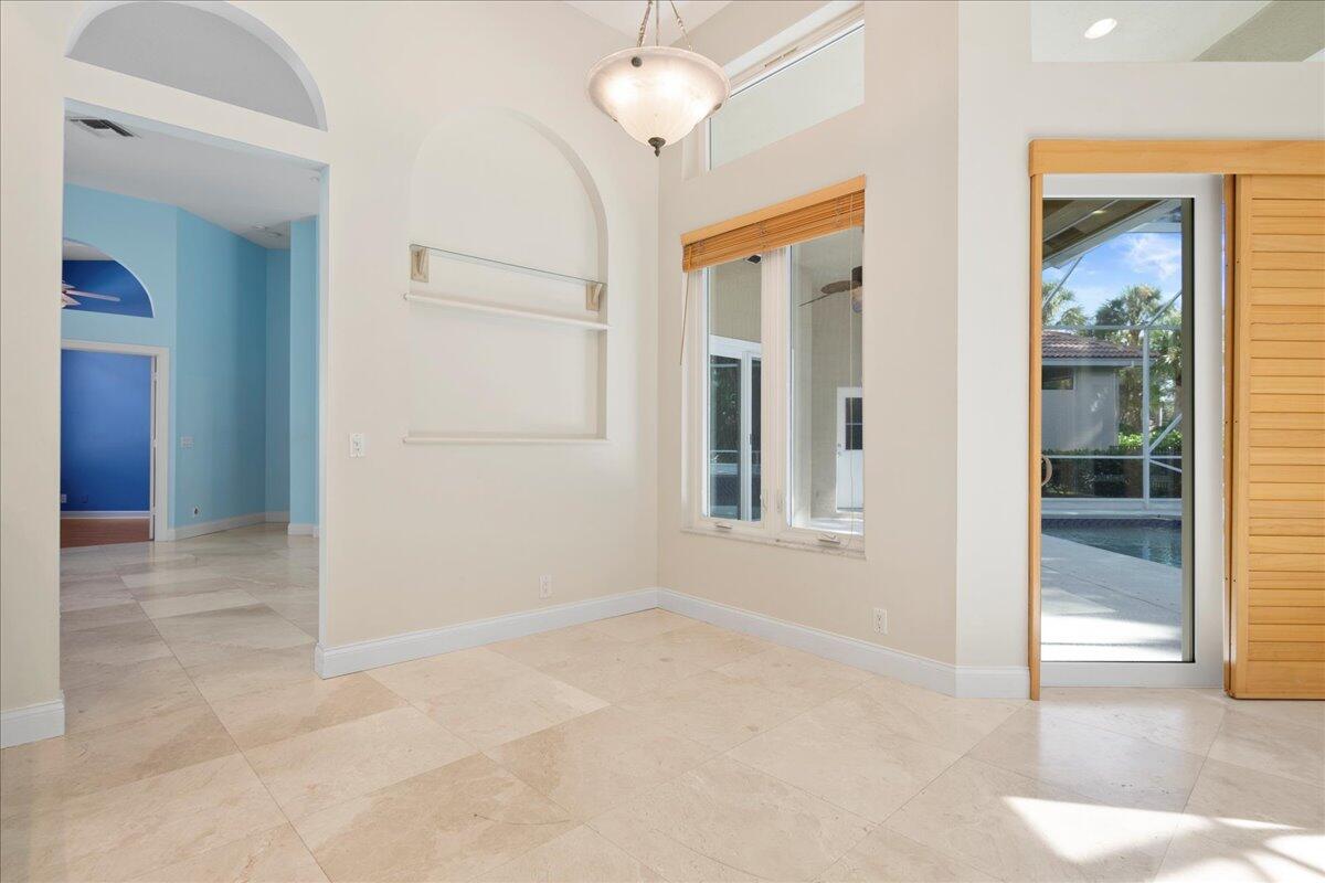 6989 Cypress Cove Circle Jupiter, FL 33458 - Photo 21 of 47 wooden floor in an empty room