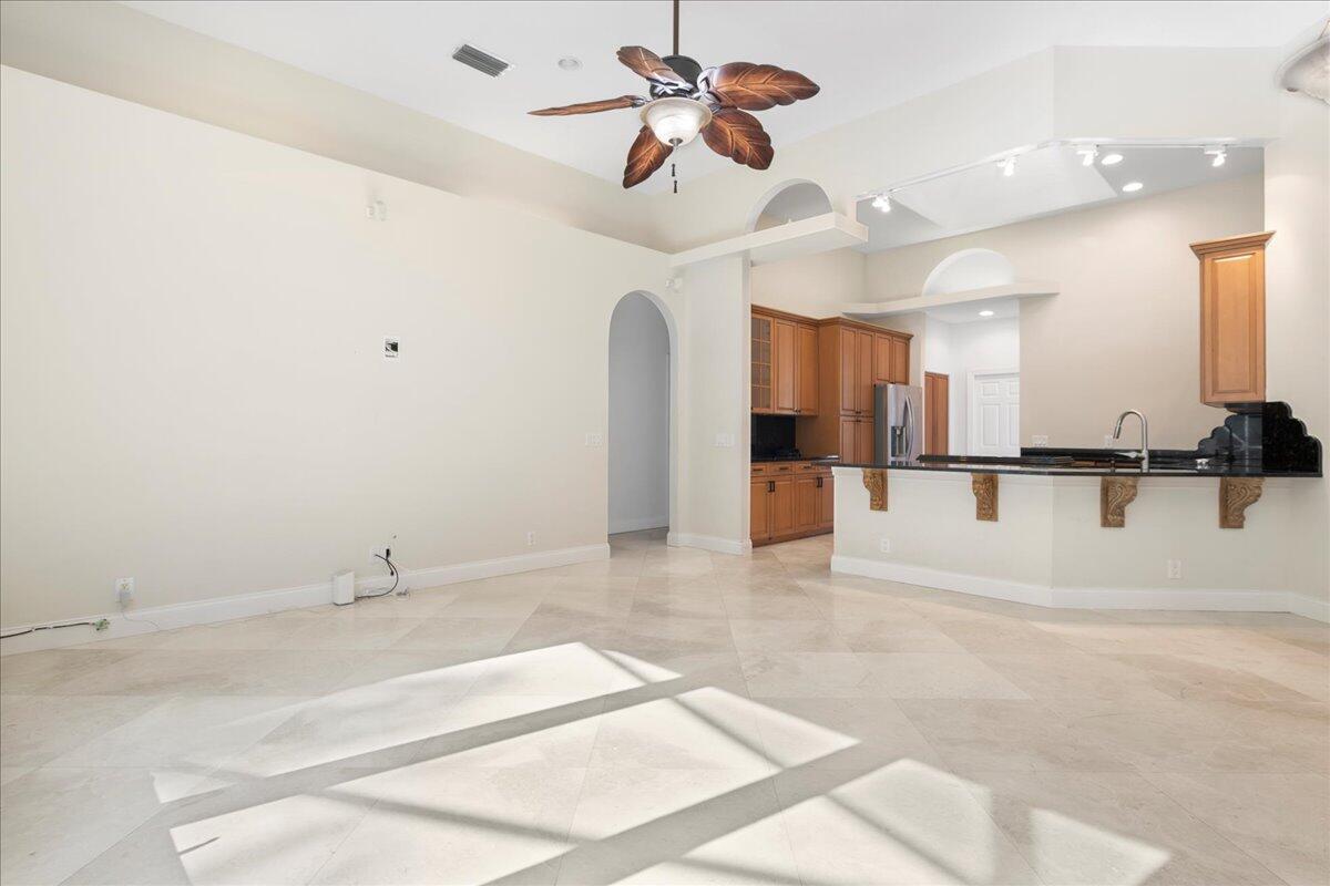 6989 Cypress Cove Circle Jupiter, FL 33458 - Photo 22 of 47 a view of a kitchen with a sink