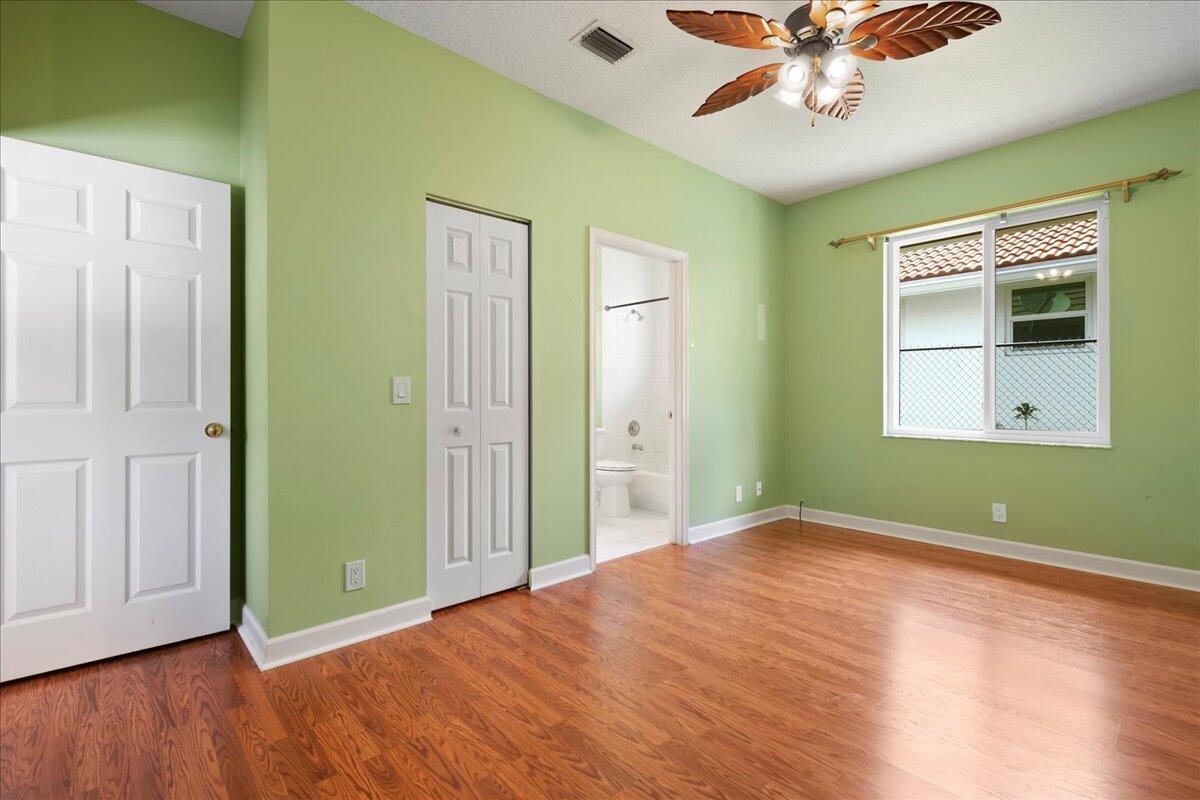 6989 Cypress Cove Circle Jupiter, FL 33458 - Photo 34 of 47 a view of empty room with wooden floor