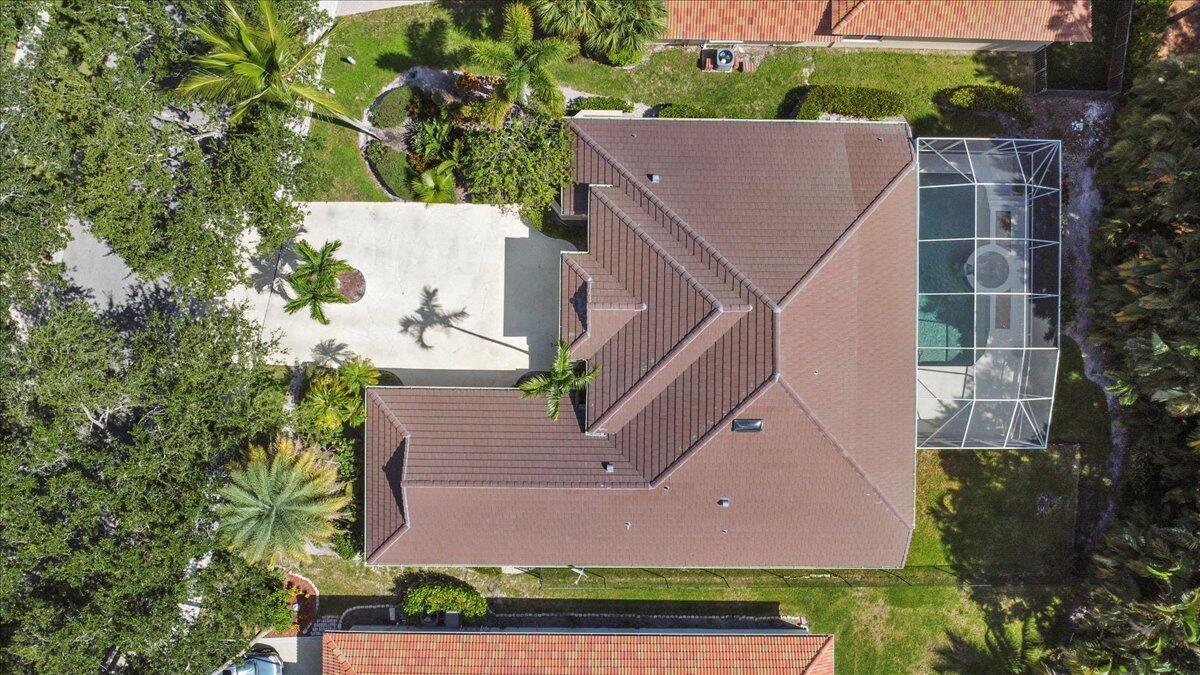 6989 Cypress Cove Circle Jupiter, FL 33458 - Photo 46 of 47 an aerial view of house with yard