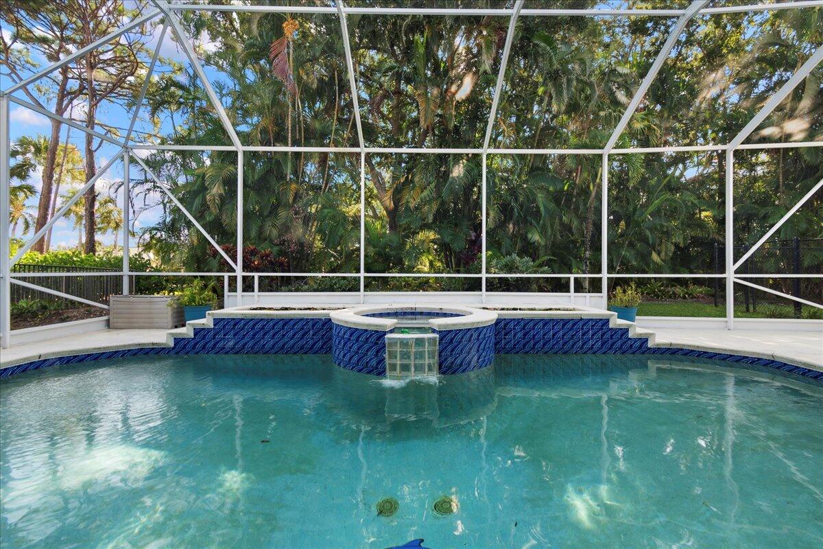 6989 Cypress Cove Circle Jupiter, FL 33458 - Photo 6 of 47 a view of a balcony with a swimming pool