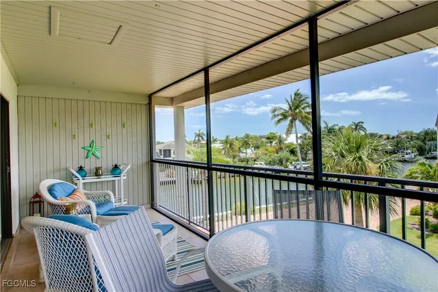 a view of balcony with furniture