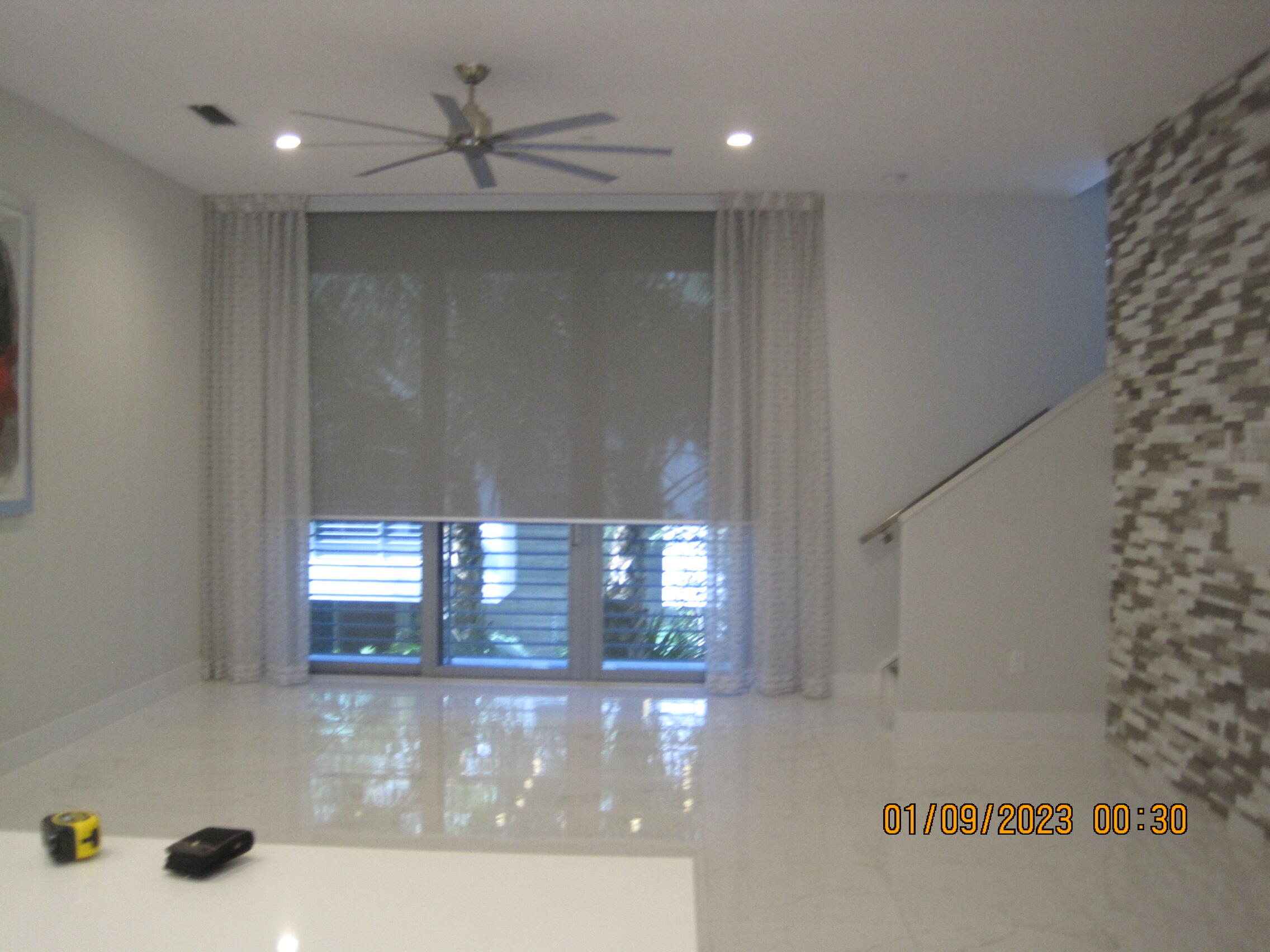 4033 Northwest 17th Way Boca Raton, FL 33431 - Photo 11 of 17 a view of a livingroom with a ceiling fan and window