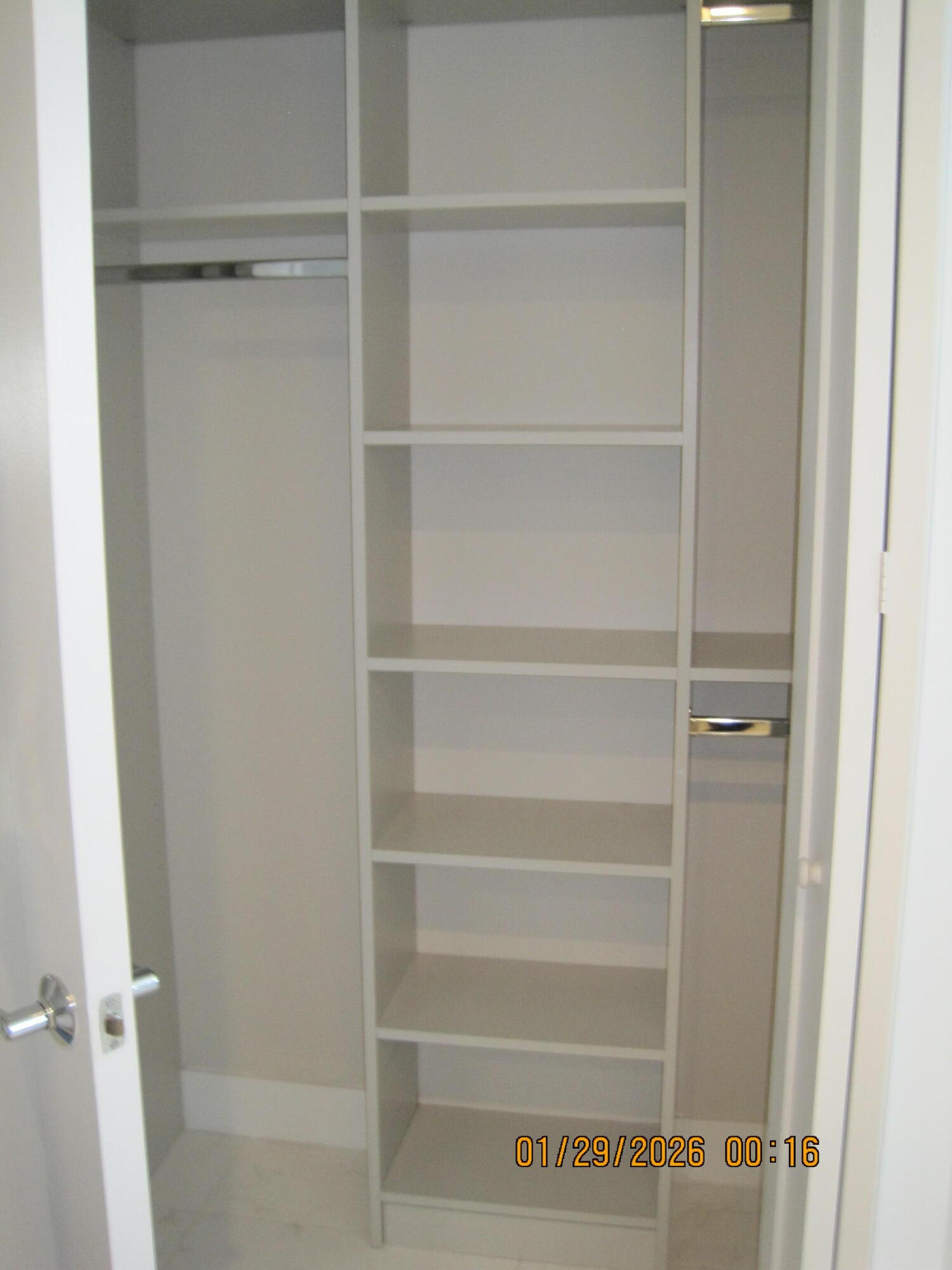 4033 Northwest 17th Way Boca Raton, FL 33431 - Photo 13 of 17 a view of walk in closet with empty racks