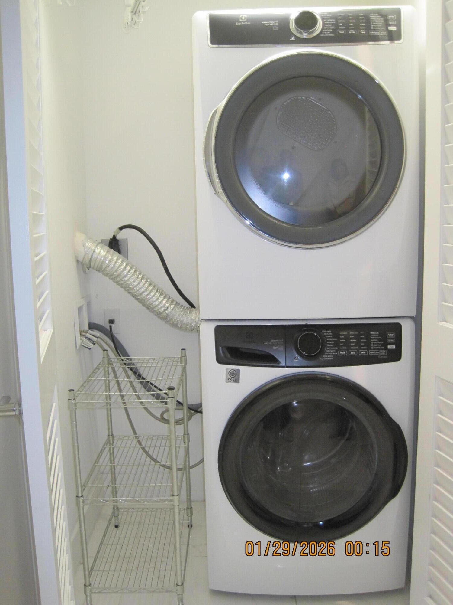 4033 Northwest 17th Way Boca Raton, FL 33431 - Photo 14 of 17 a utility room with dryer and washer