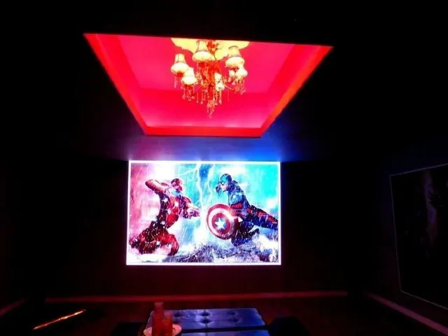 a bed sitting in a room next to a window