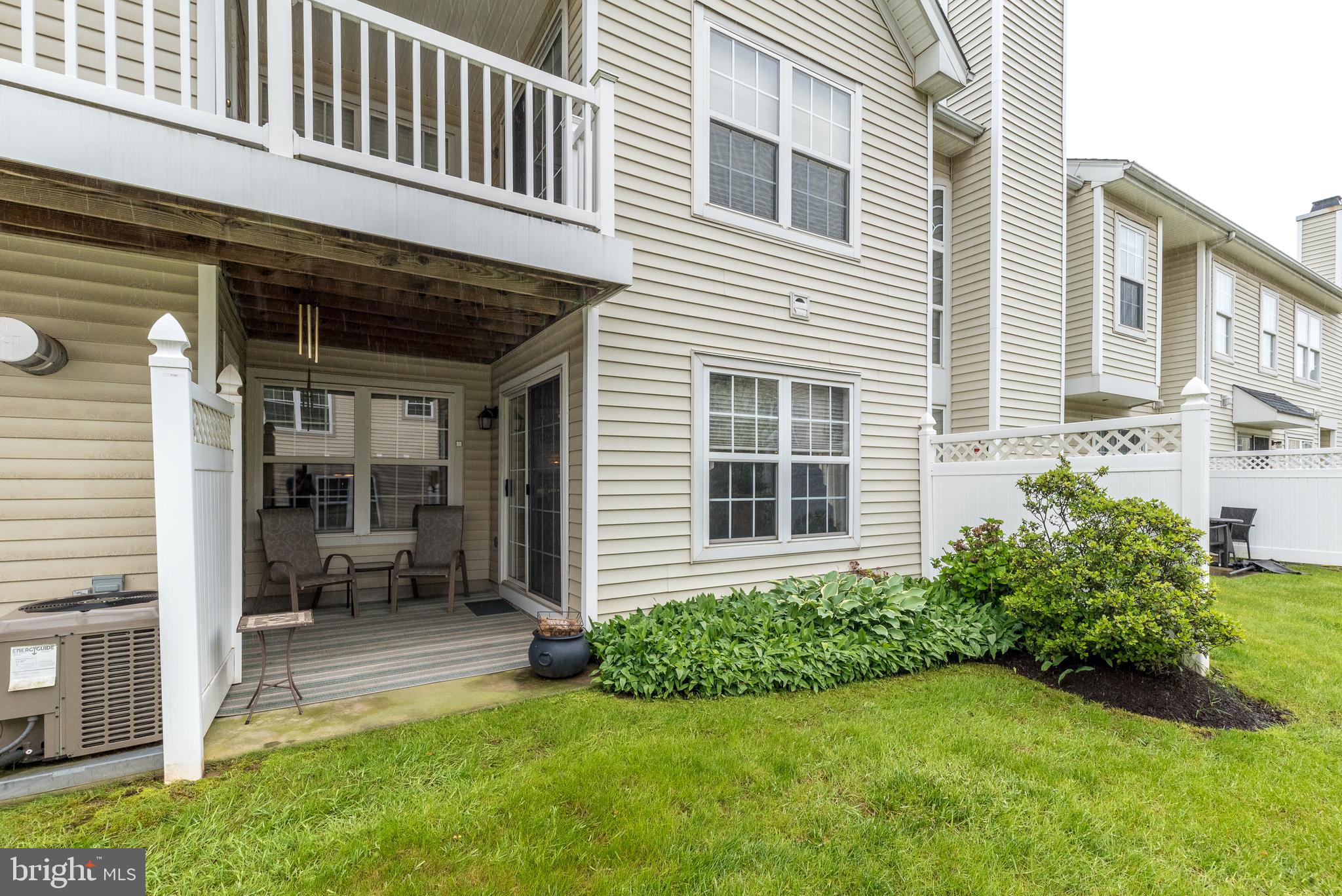 205 Strawberry Court Warminster, PA 18974 - Photo 5 of 6 a view of a house with a yard and sitting area