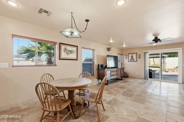 a view of a dining room with furniture