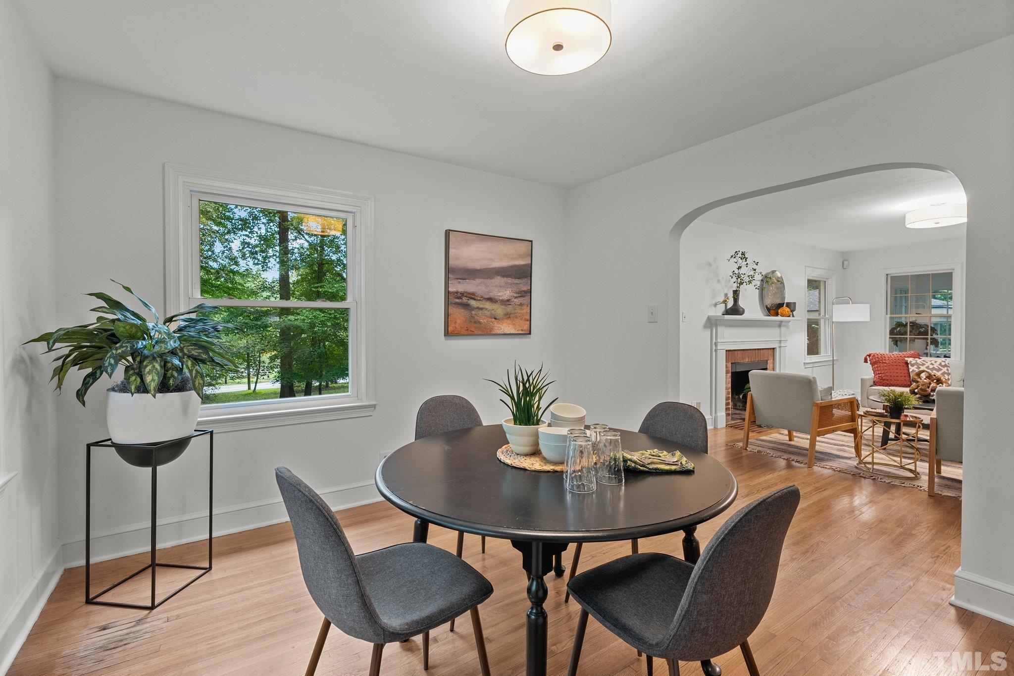 386 St Marys Road Hillsborough, NC 27278 - Photo 15 of 64 a view of a dining room with furniture window and wooden floor