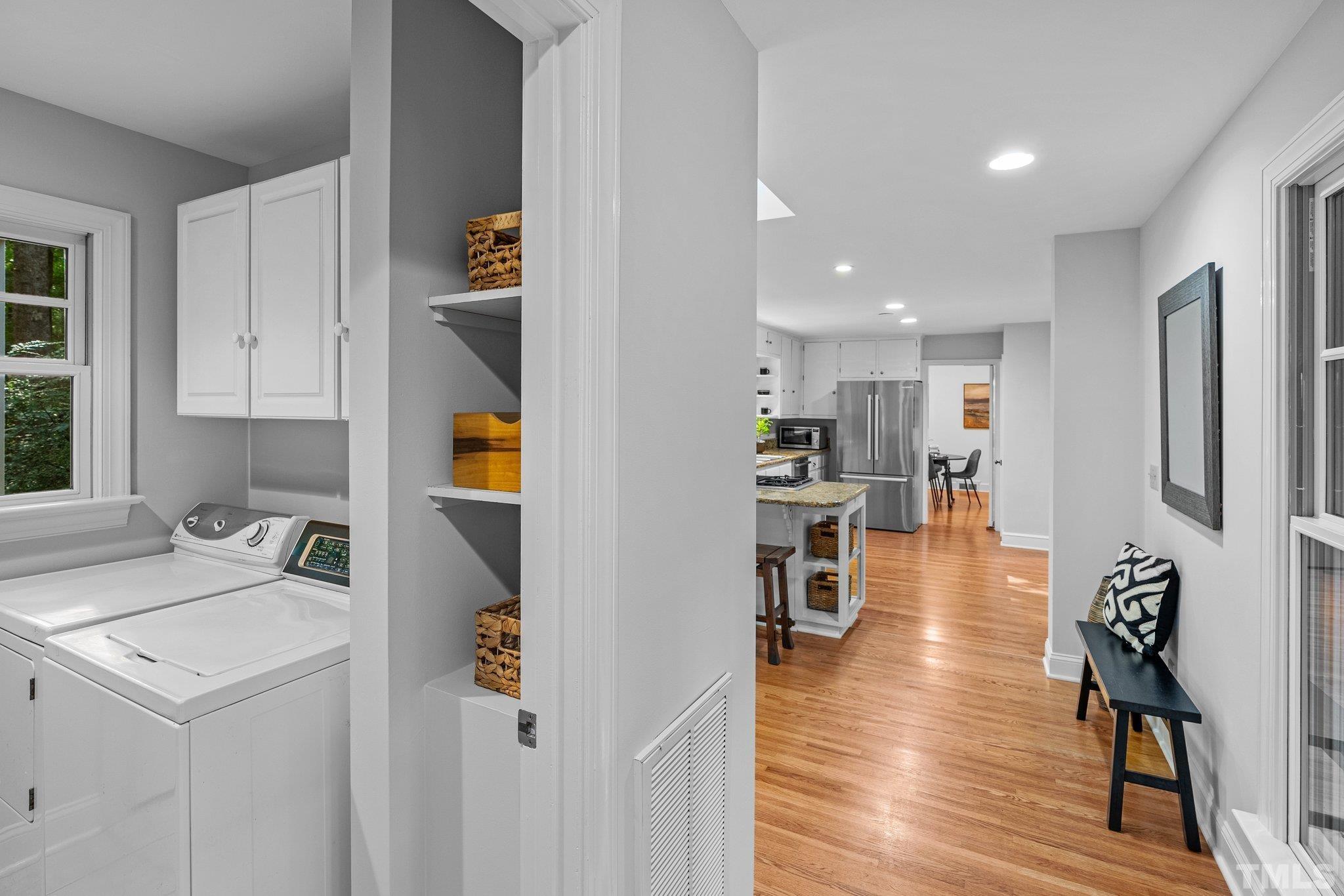 386 St Marys Road Hillsborough, NC 27278 - Photo 20 of 64 a kitchen with a refrigerator and a stove top oven