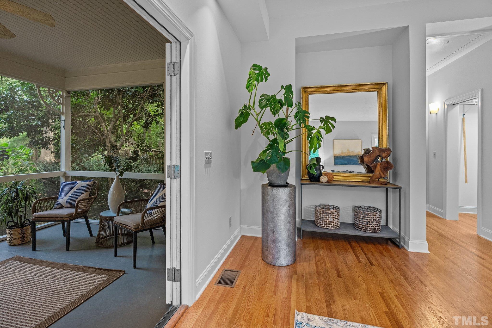 386 St Marys Road Hillsborough, NC 27278 - Photo 26 of 64 a workspace with furniture and a potted plant