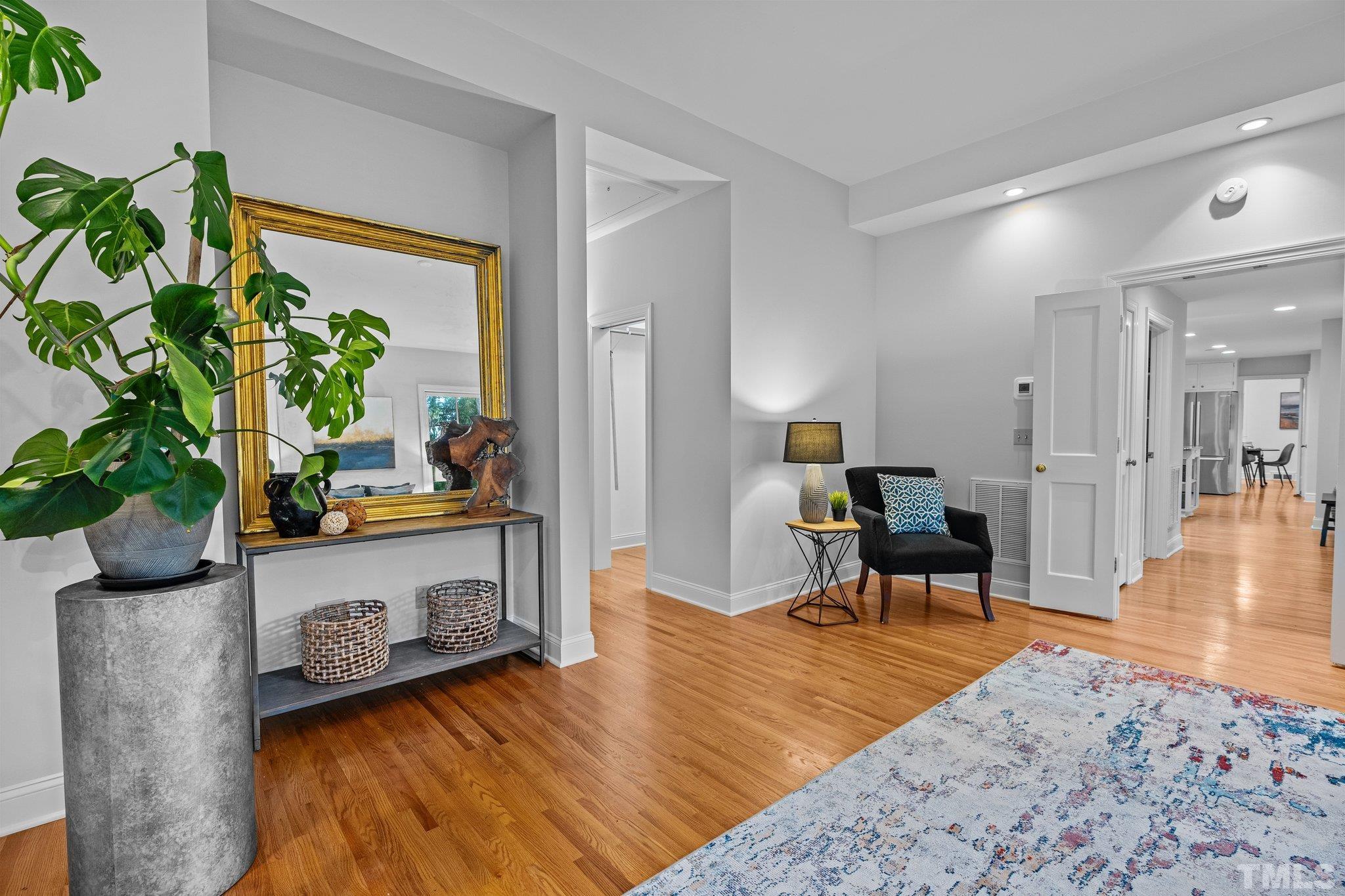 386 St Marys Road Hillsborough, NC 27278 - Photo 27 of 64 a living room with furniture and a potted plant
