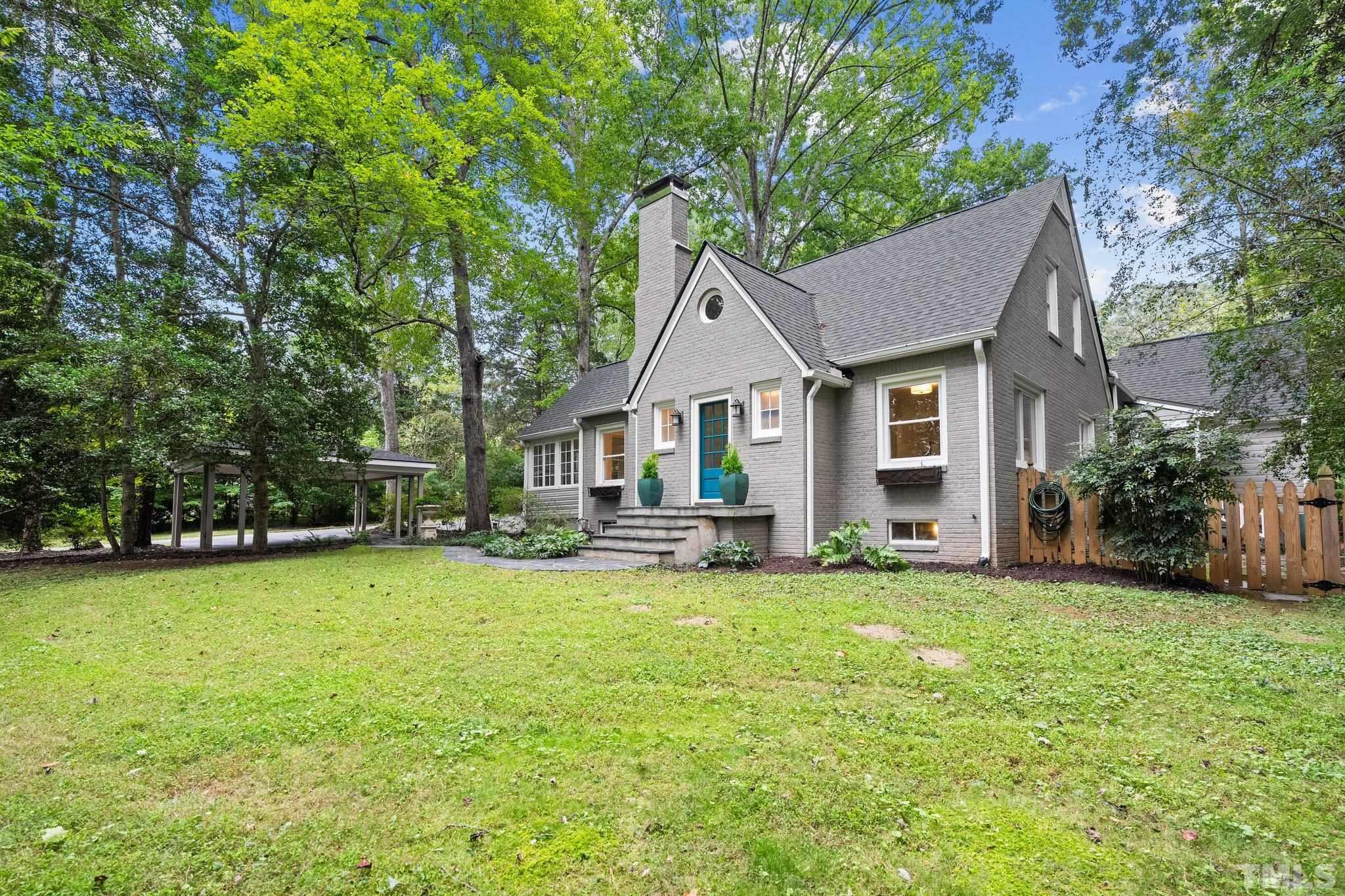 386 St Marys Road Hillsborough, NC 27278 - Photo 3 of 64 a view of a house with a yard and sitting area