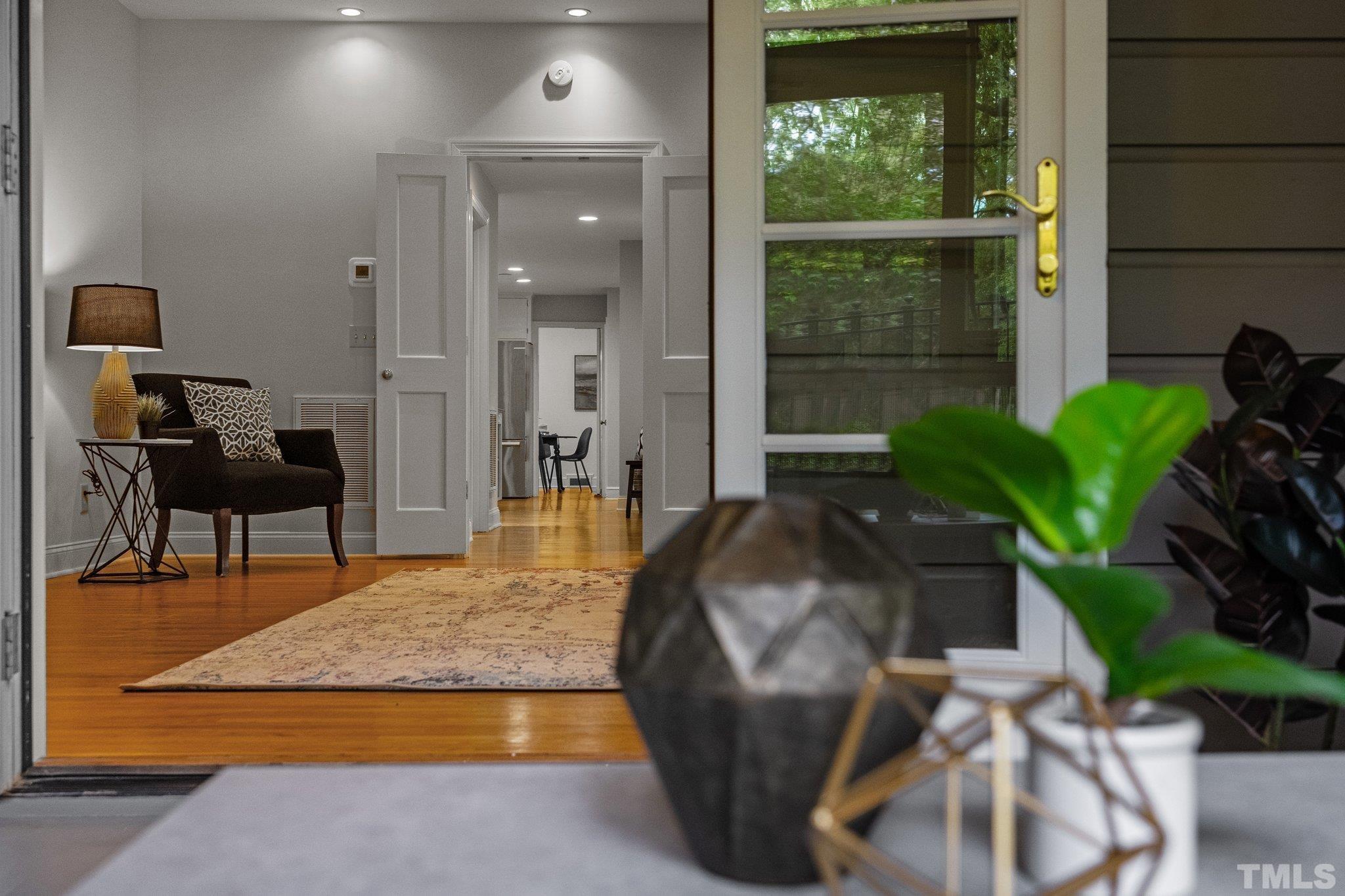 386 St Marys Road Hillsborough, NC 27278 - Photo 31 of 64 a living room with furniture and a potted plant