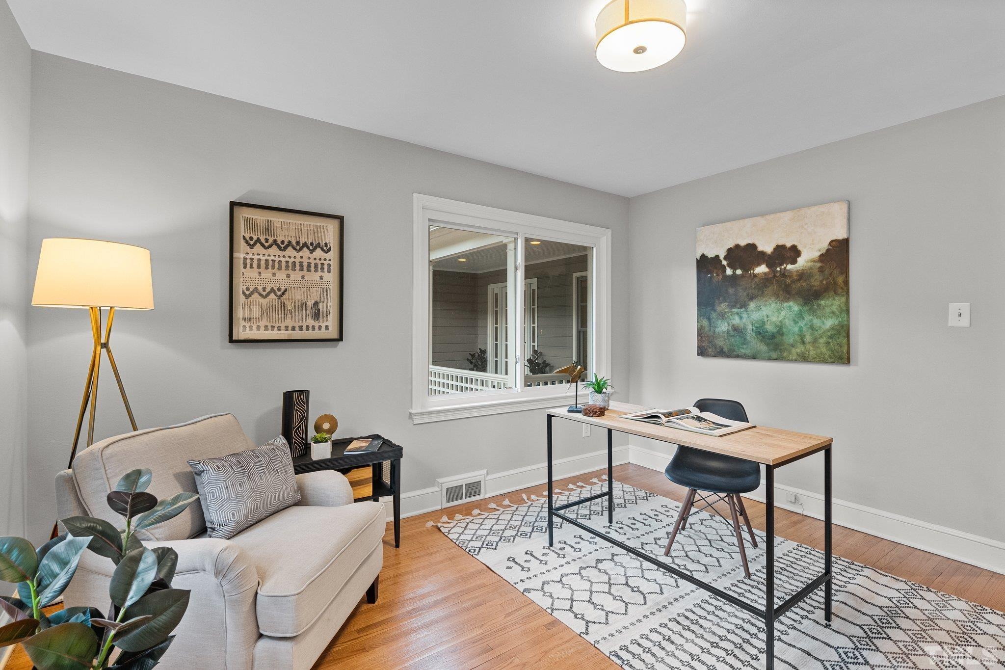 386 St Marys Road Hillsborough, NC 27278 - Photo 36 of 64 a living room with furniture a window and a lamp