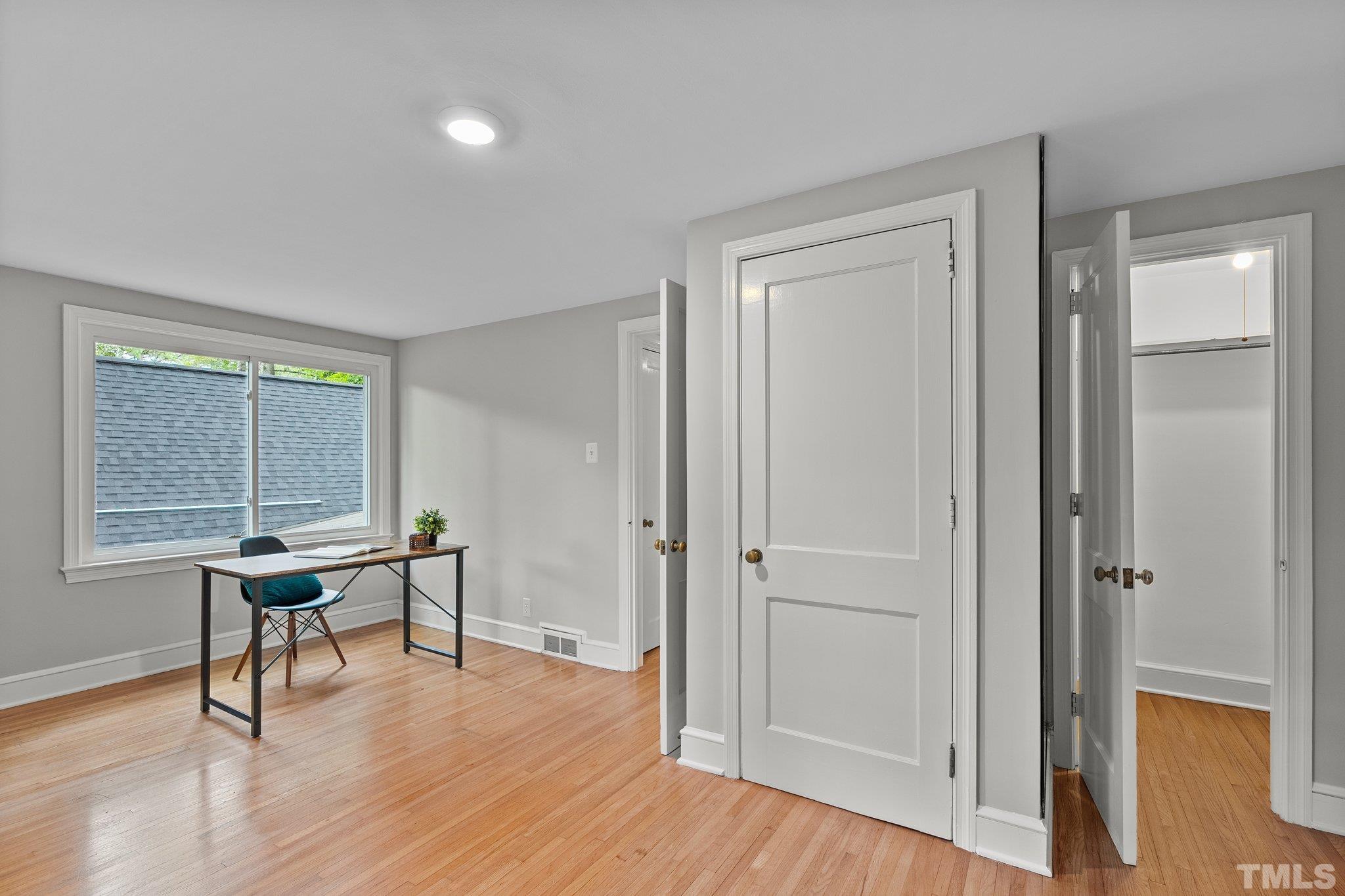 386 St Marys Road Hillsborough, NC 27278 - Photo 40 of 64 a view of a workspace with furniture and a window