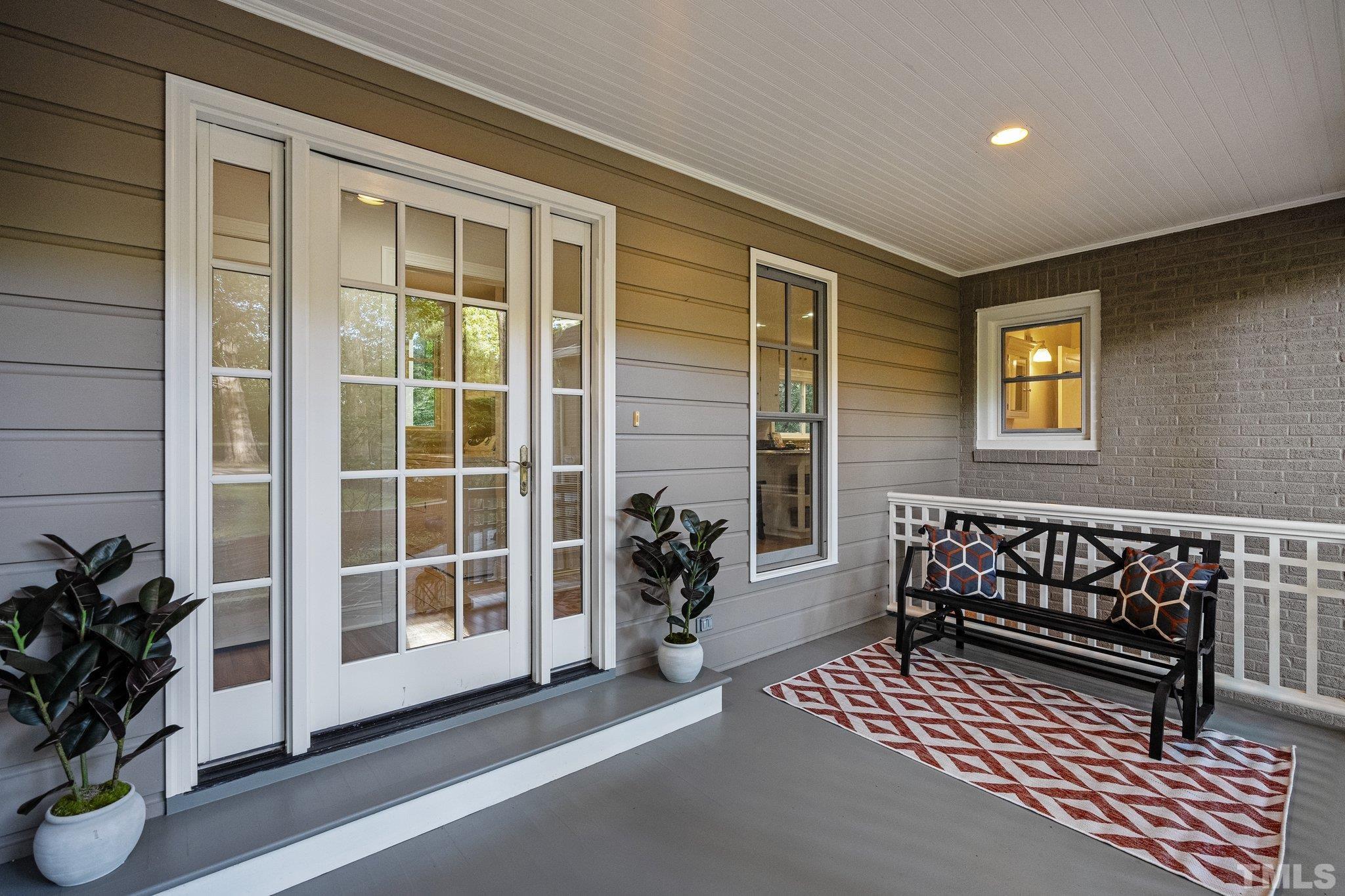 386 St Marys Road Hillsborough, NC 27278 - Photo 44 of 64 a view of a chairs and table in the patio