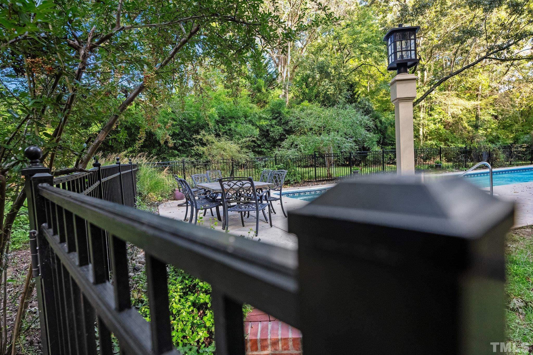 386 St Marys Road Hillsborough, NC 27278 - Photo 49 of 64 a view of a balcony with furniture