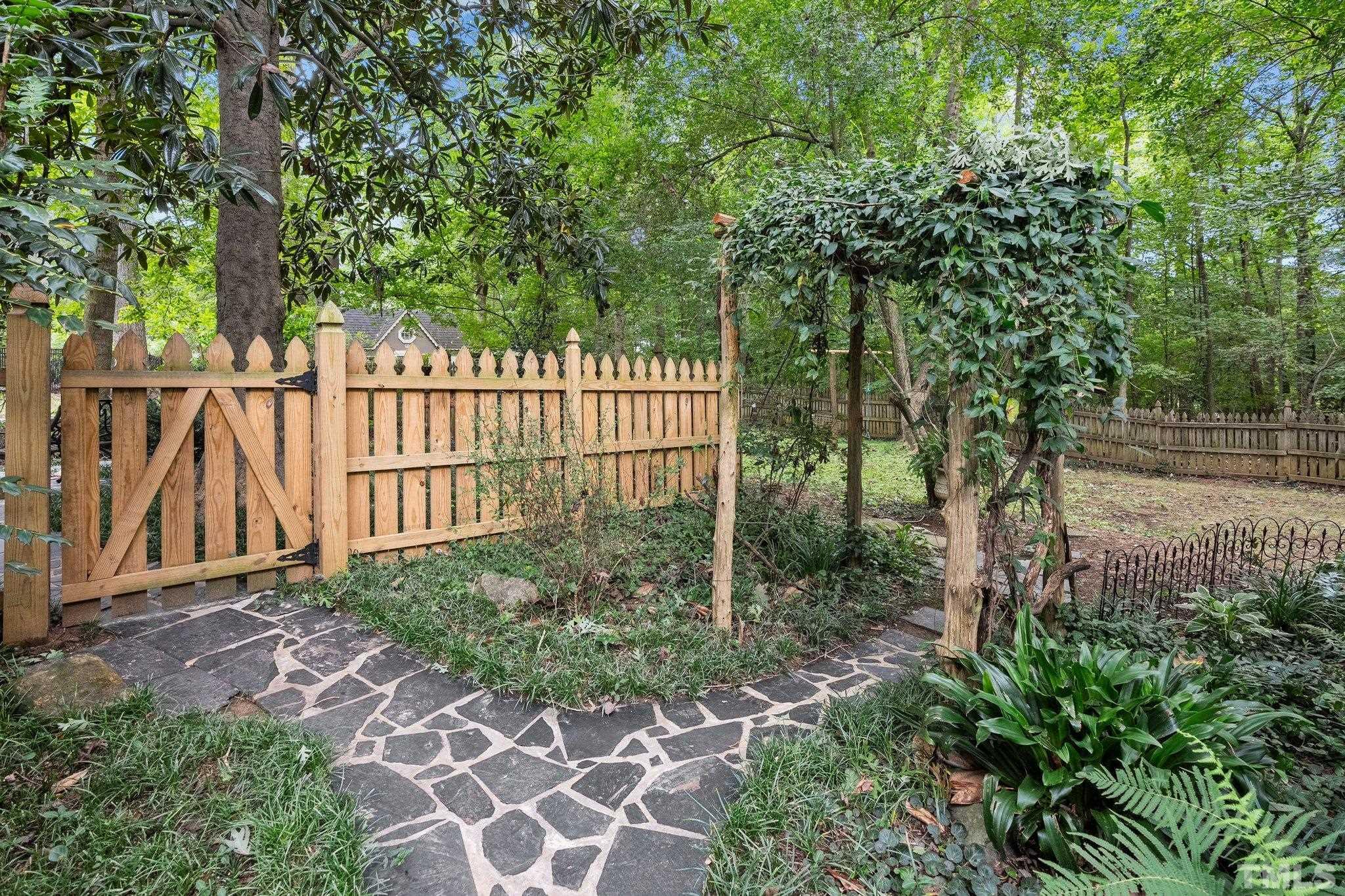 386 St Marys Road Hillsborough, NC 27278 - Photo 51 of 64 a view of a yard with large trees