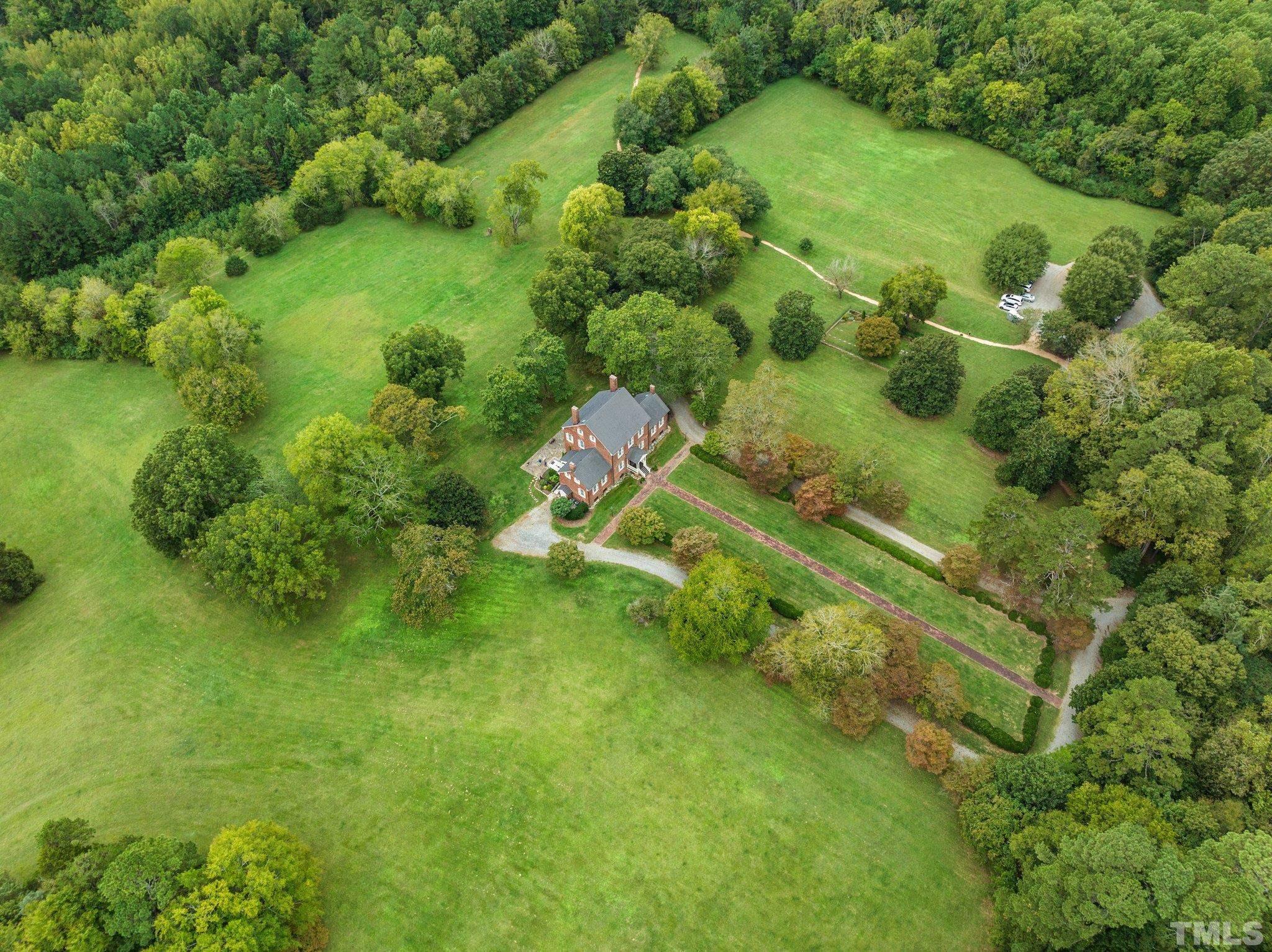 386 St Marys Road Hillsborough, NC 27278 - Photo 58 of 64 a garden view with a lake