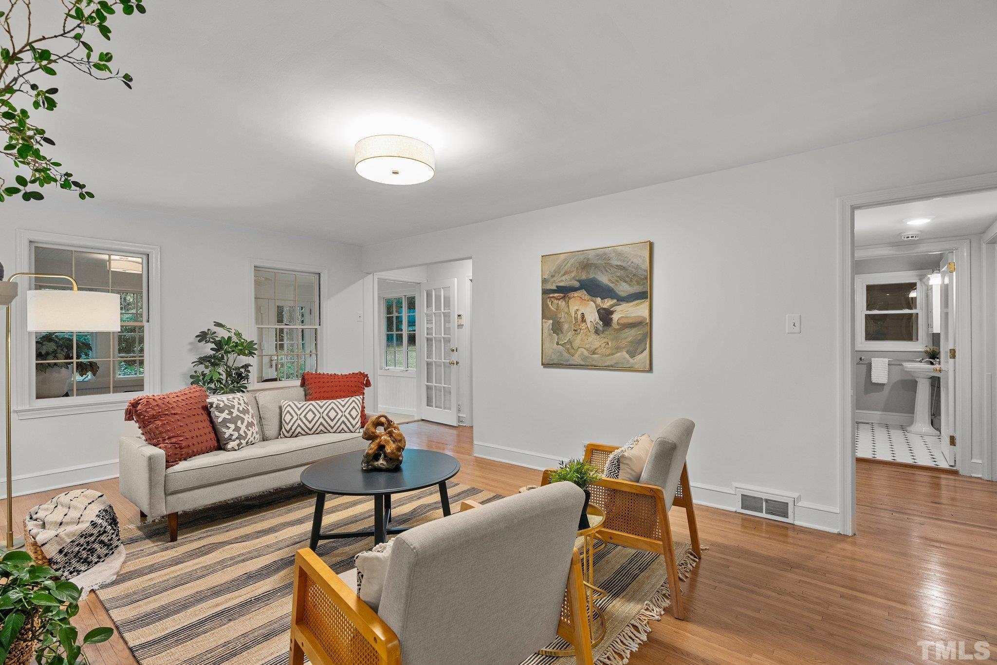 386 St Marys Road Hillsborough, NC 27278 - Photo 6 of 64 a living room with furniture and wooden floor