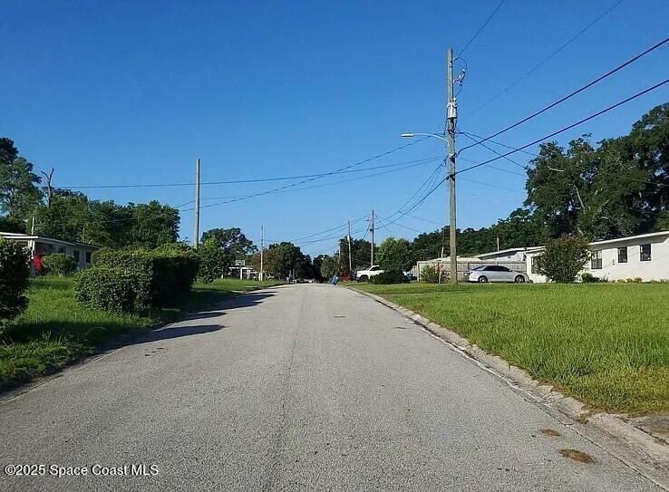 7143 Oakney Road Jacksonville, FL 32211 - Photo 5 of 5 a view of a house with a yard