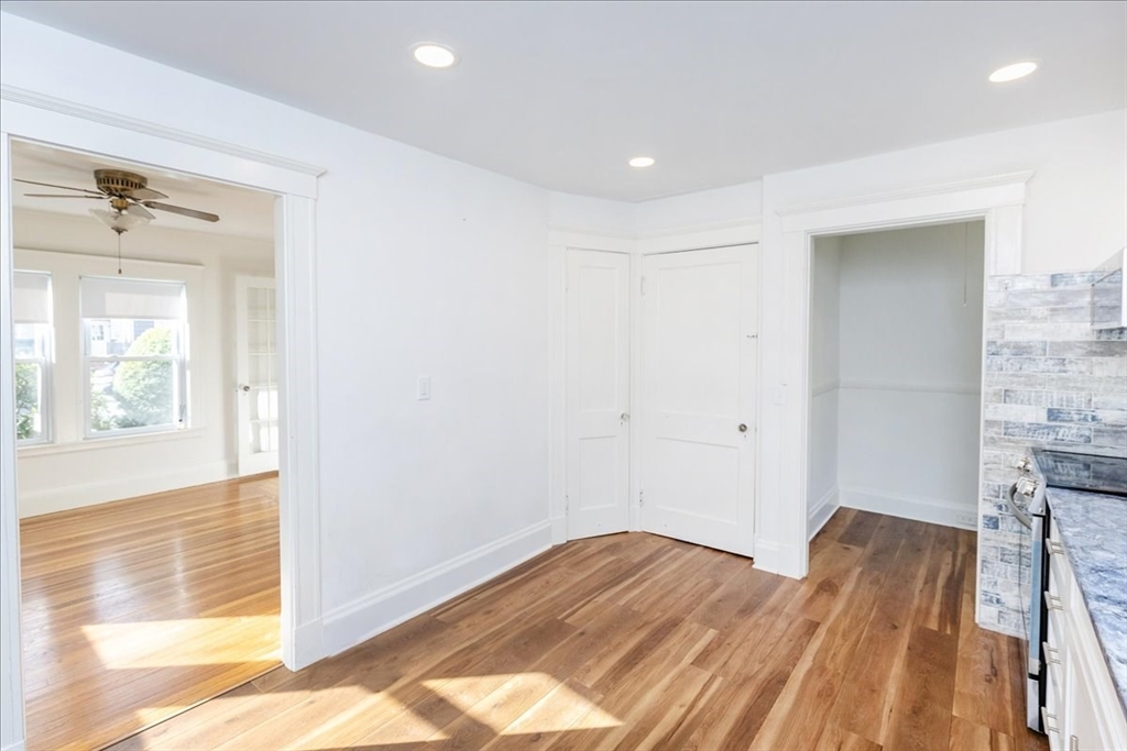 2 Martin Street Marblehead, MA 01945 - Photo 15 of 40 a view of a room with wooden floor and cabinet