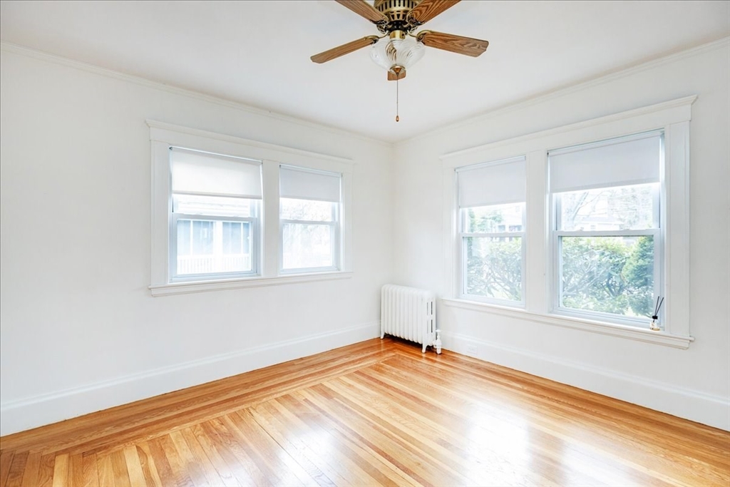 2 Martin Street Marblehead, MA 01945 - Photo 17 of 40 a view of a room with a window and ceiling fan