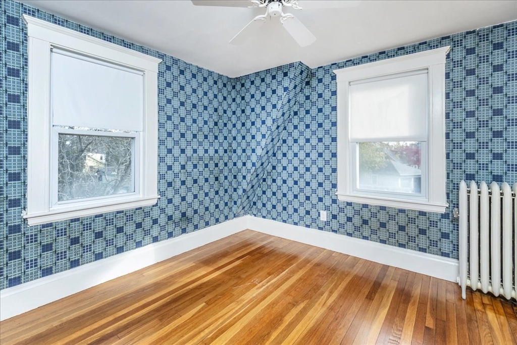 2 Martin Street Marblehead, MA 01945 - Photo 26 of 40 a bedroom with a bed and a window