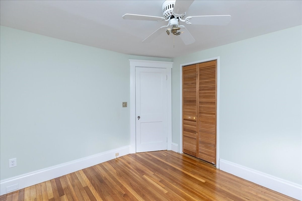 2 Martin Street Marblehead, MA 01945 - Photo 32 of 40 a view of empty room with wooden floor
