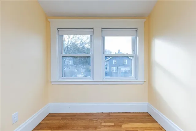 a view of a room that has a window in it