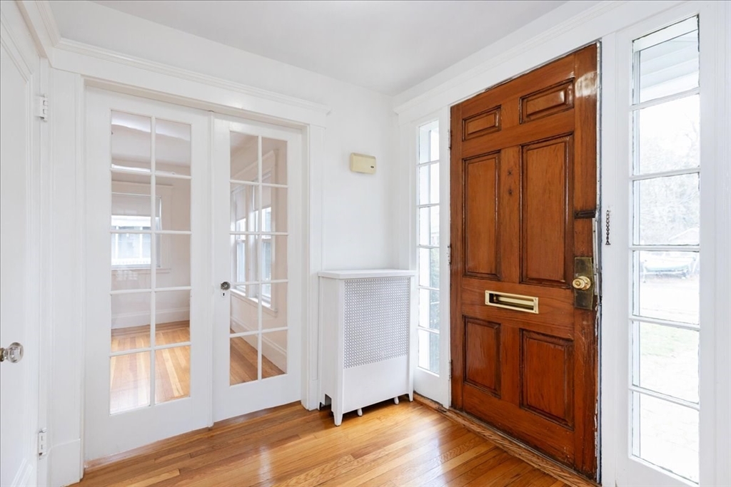 2 Martin Street Marblehead, MA 01945 - Photo 6 of 40 an empty room with wooden floor closet and windows