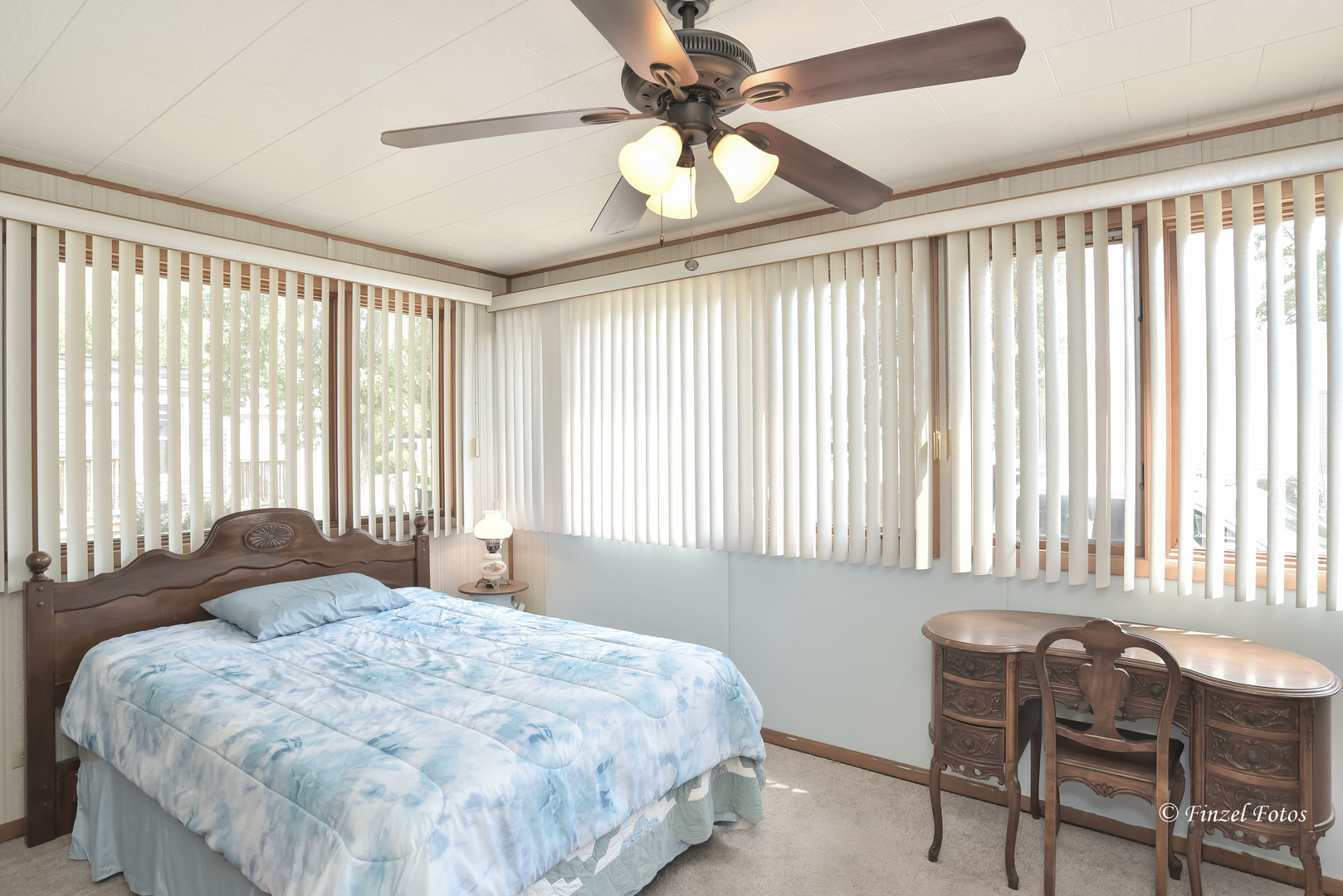 1158 Country Club Road Elgin, IL 60123 - Photo 11 of 16 a bedroom with a bed and a chair