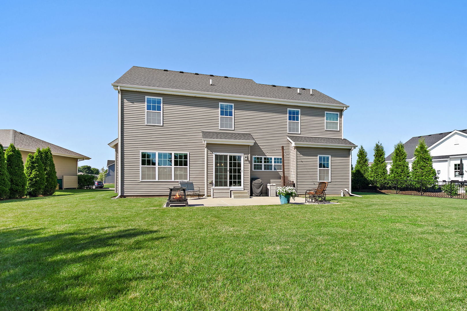 1109 Nottingham Road Sycamore, IL 60178 - Photo 33 of 44 a view of a house with a yard and sitting area