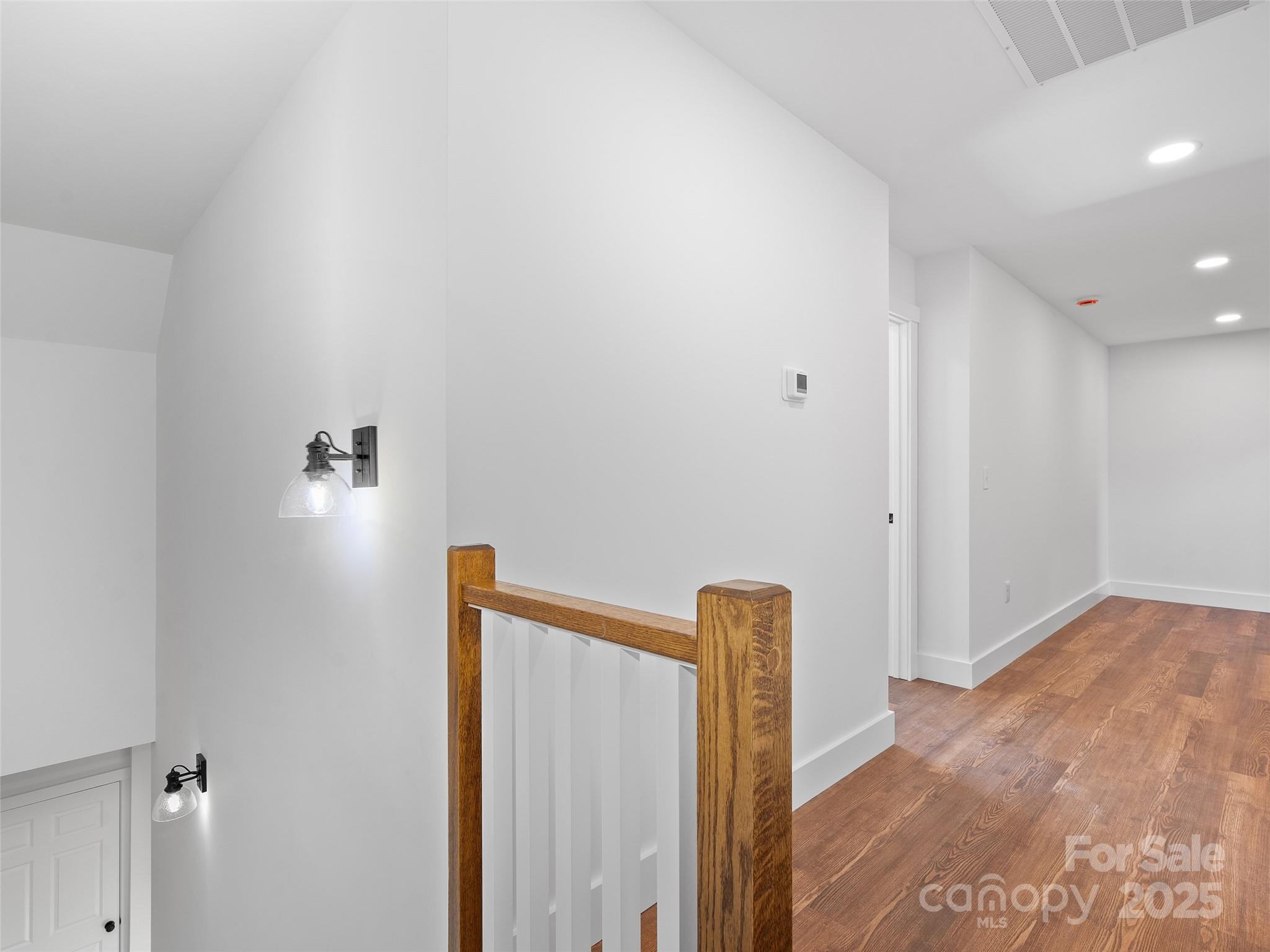 11 Riemar Lane Waynesville, NC 28786 - Photo 14 of 37 a view of empty room with wooden floor