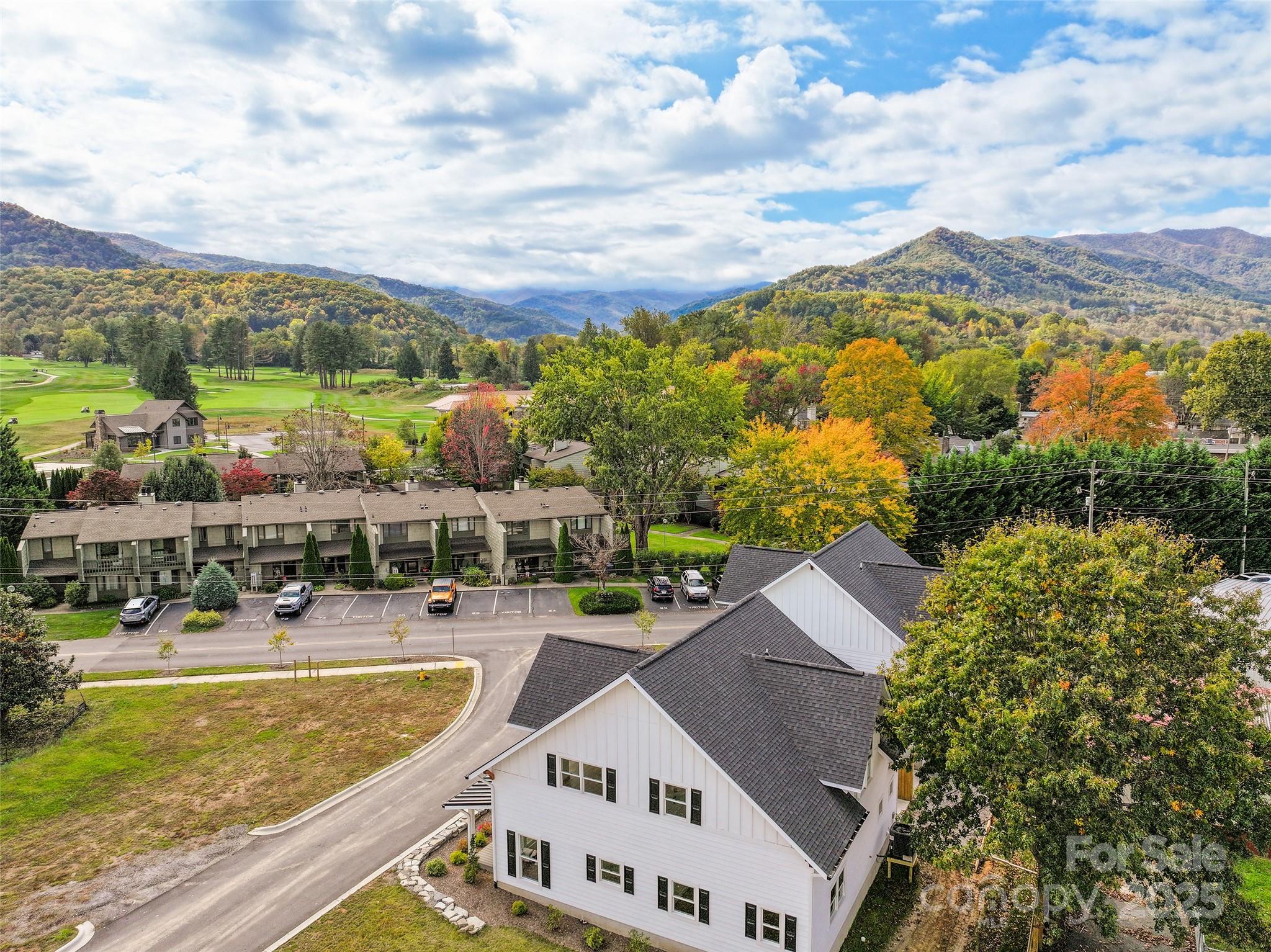 11 Riemar Lane Waynesville, NC 28786 - Photo 2 of 37 a view of a swimming pool with a lake view