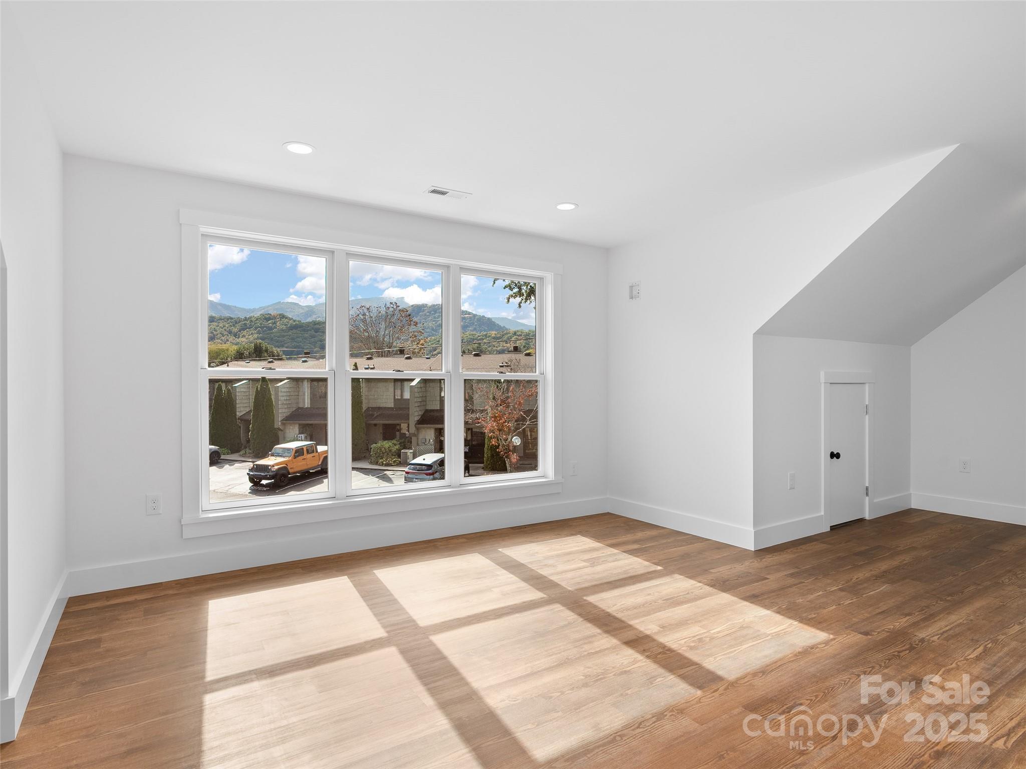 11 Riemar Lane Waynesville, NC 28786 - Photo 25 of 37 a view of an empty room with a window
