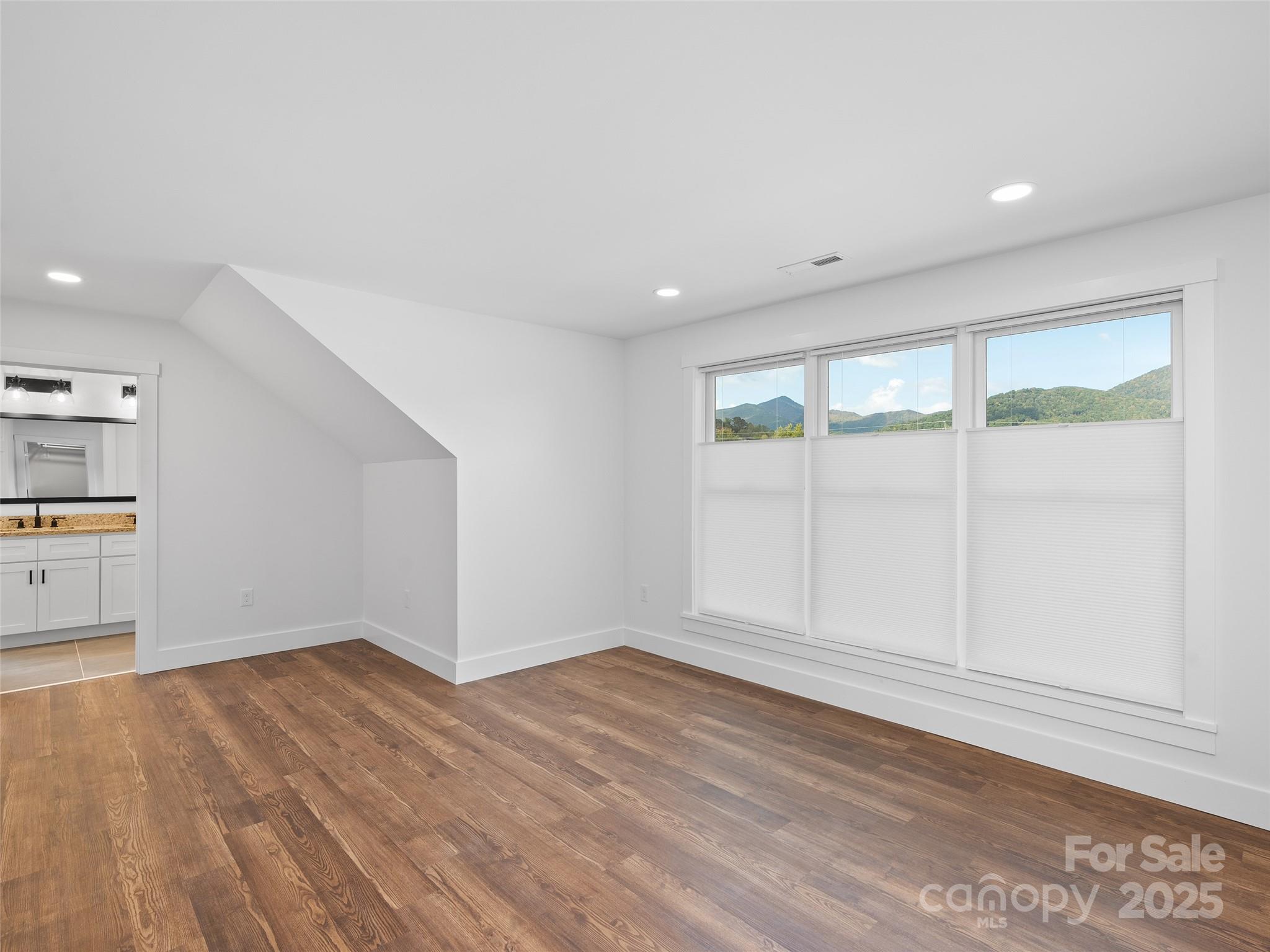 11 Riemar Lane Waynesville, NC 28786 - Photo 30 of 37 a view of empty room with wooden floor