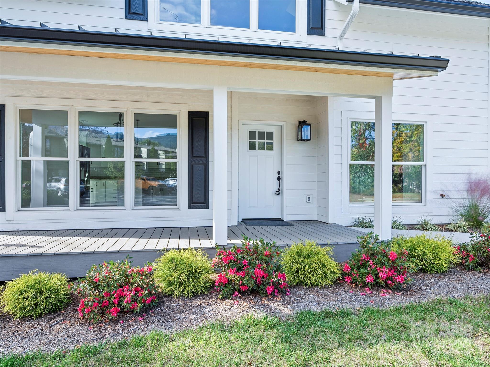 11 Riemar Lane Waynesville, NC 28786 - Photo 33 of 37 a view of a house with flower pots
