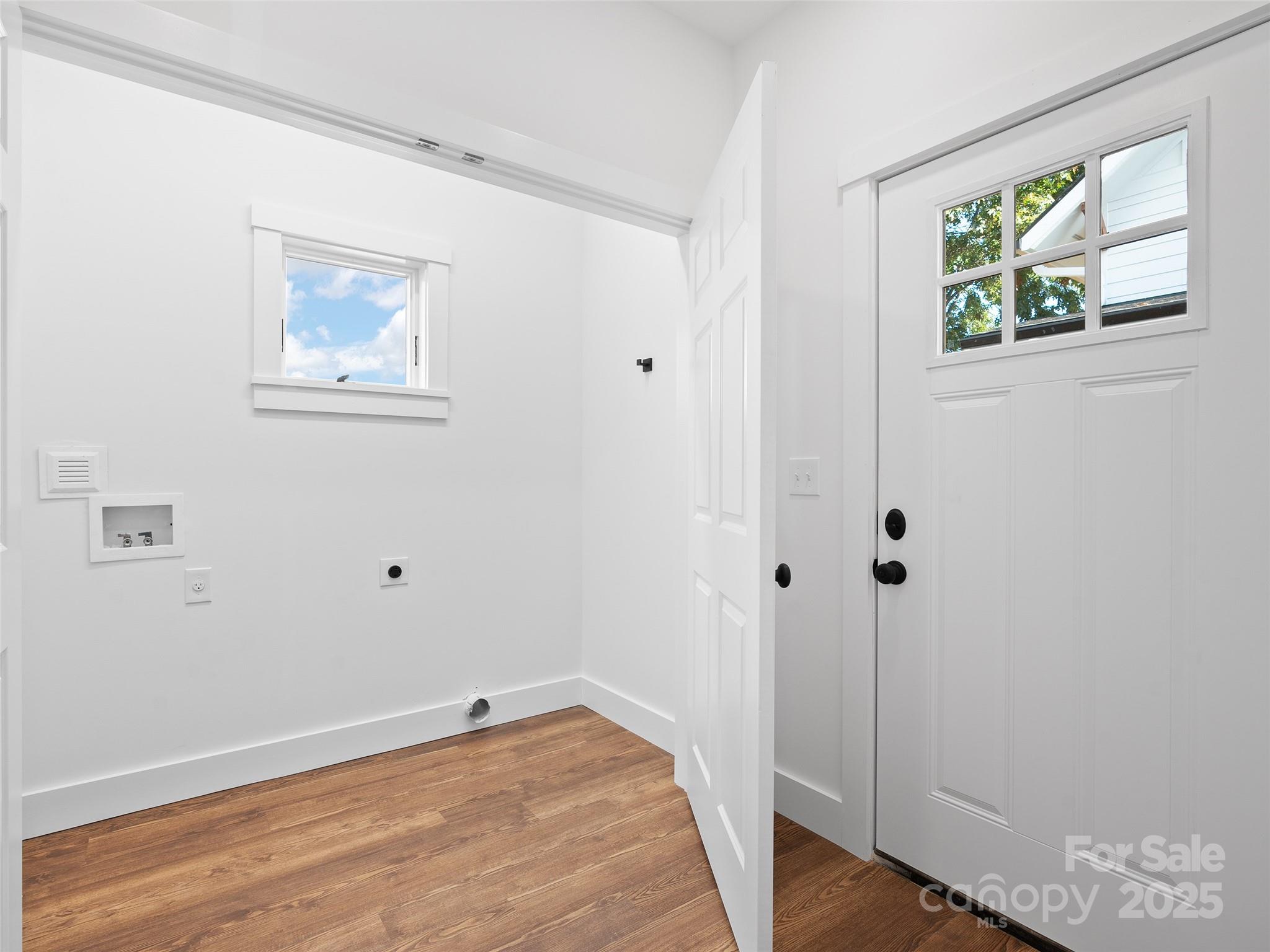11 Riemar Lane Waynesville, NC 28786 - Photo 10 of 37 a view of an empty room with wooden floor and closet