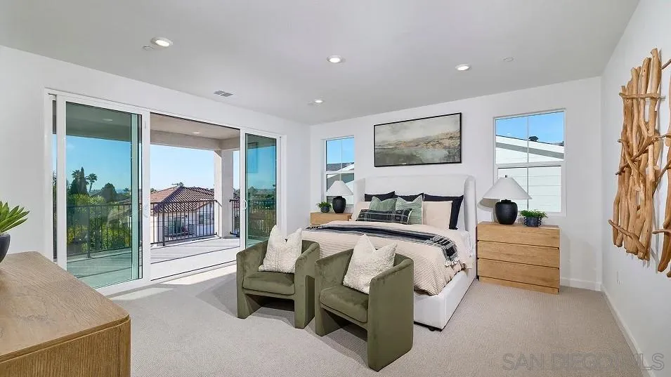 2312 Loker Way Oceanside, CA 92054 - Photo 18 of 20 a bedroom with furniture and a painting on the wall