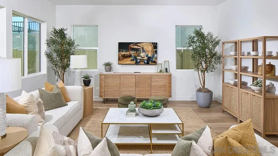 2312 Loker Way Oceanside, CA 92054 - Photo 9 of 20 a living room with furniture and a potted plant