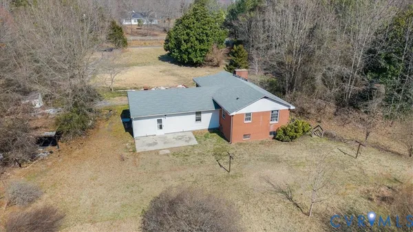 a backyard of a house with lots of green space