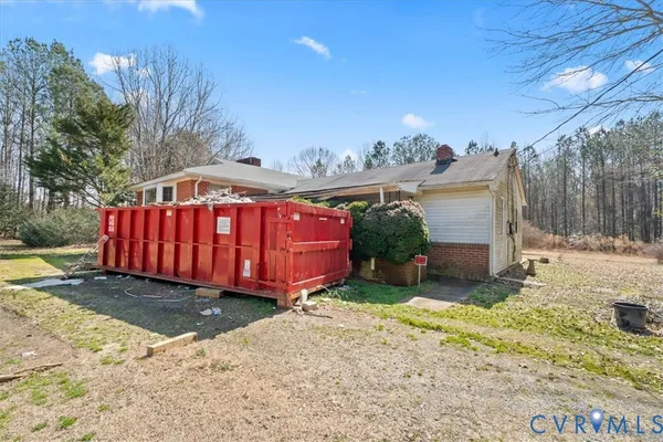 a view of a backyard with trees