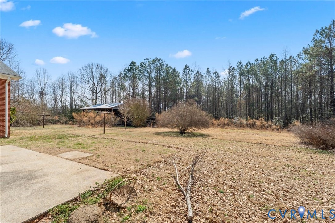 10401 Carriage Road Providence Forge, VA 23140 - Photo 5 of 30 a view of a yard with a tree
